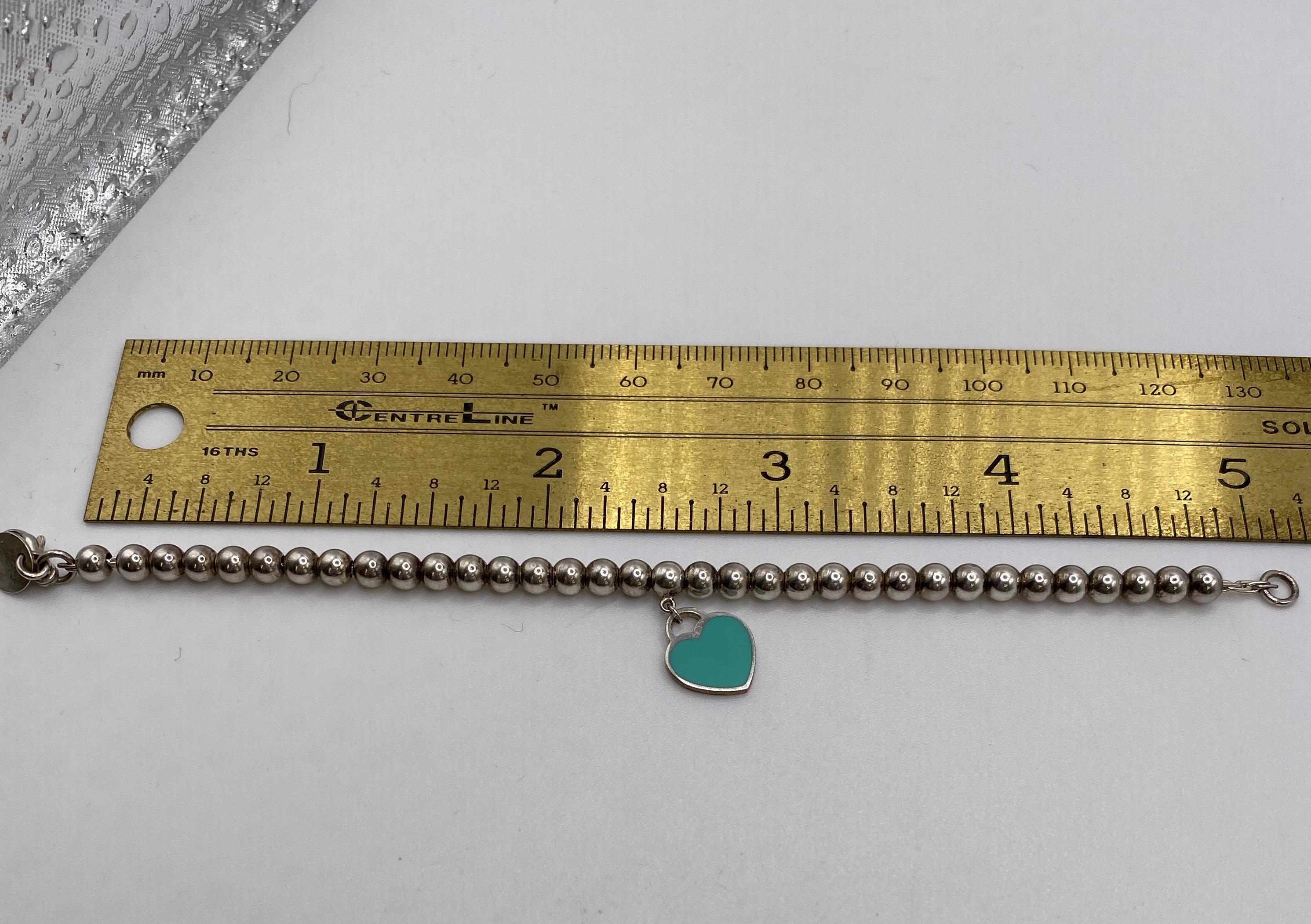 Tiffany & Co Return to Tiffany sterling silver 4mm bead bracelet with teal heart pendant. 5