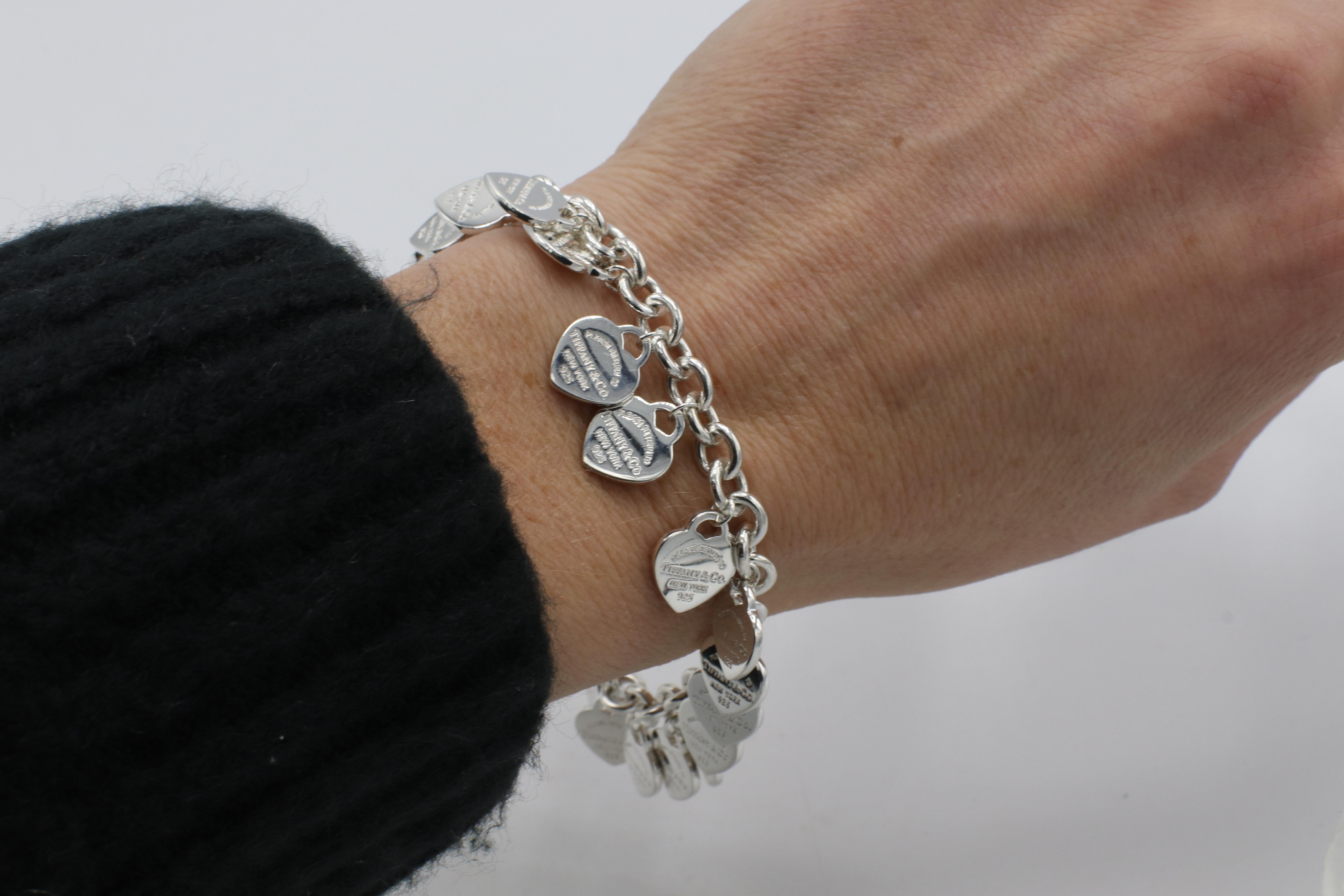 Tiffany & Co. Return to Tiffany Sterling Silver Multi Heart Charm Tag Bracelet In Excellent Condition In  Baltimore, MD