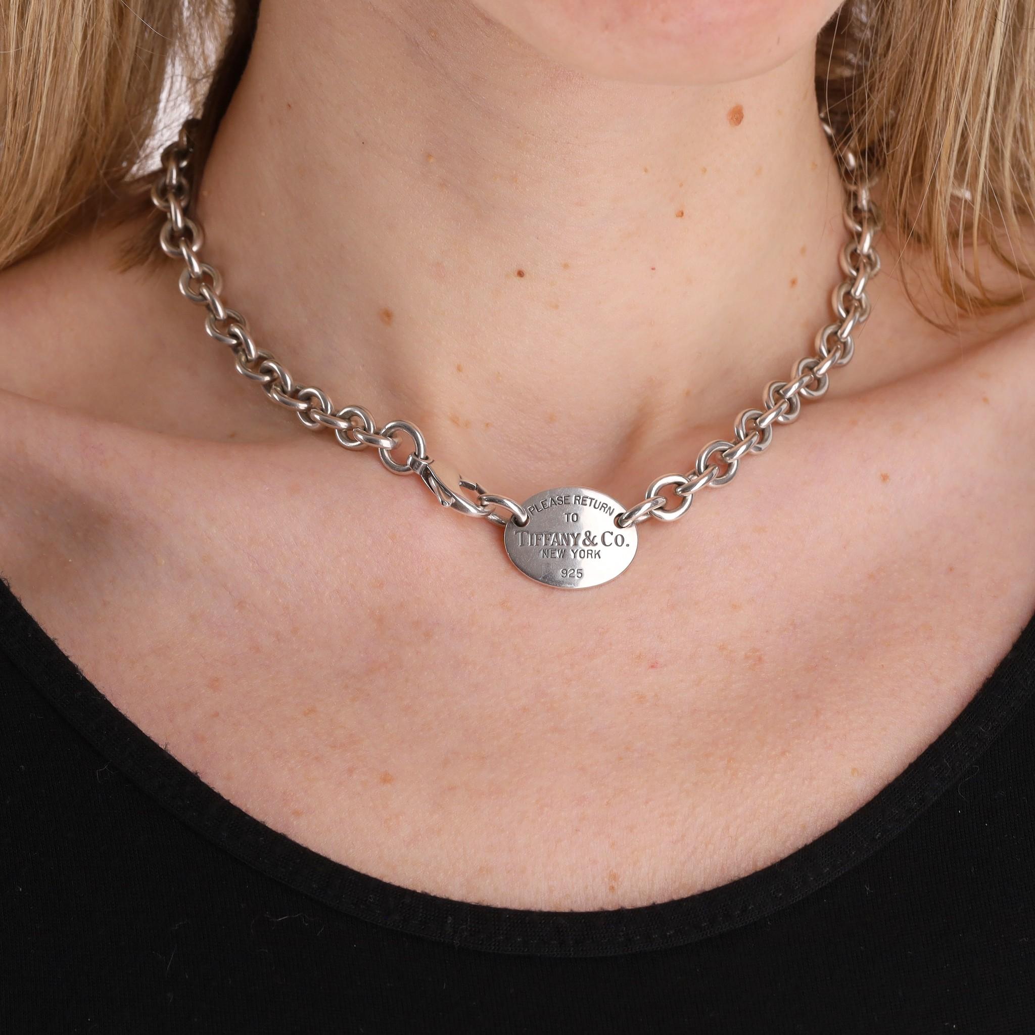 Tiffany & Co.  Return To Tiffany Sterling Silver Necklace

Silver link chain necklace designed with oval tag featuring 'Please Return to Tiffany & Co. New York 925' engravement.

Detailed with lobster claw closure to the front. 

Size – One