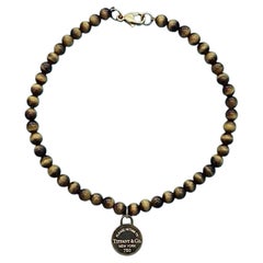 Tiffany & Co. Return to Tiffany Tiger's Eye Bead Bracelet 18K Gold Round Tag