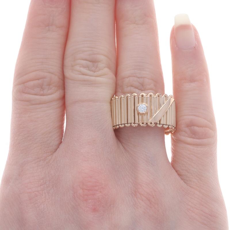 Size: 8 1/4

Brand: Tiffany & Co.
Design: Ribbon

Metal Content: 18k Rose Gold

Stone Information

Natural Diamond
Carat(s): .10ct
Cut: Round Brilliant 
Color: F
Clarity: VS1

Total Carats: .10ct

Style: Solitaire Band
Features: Ribbed Detailing
