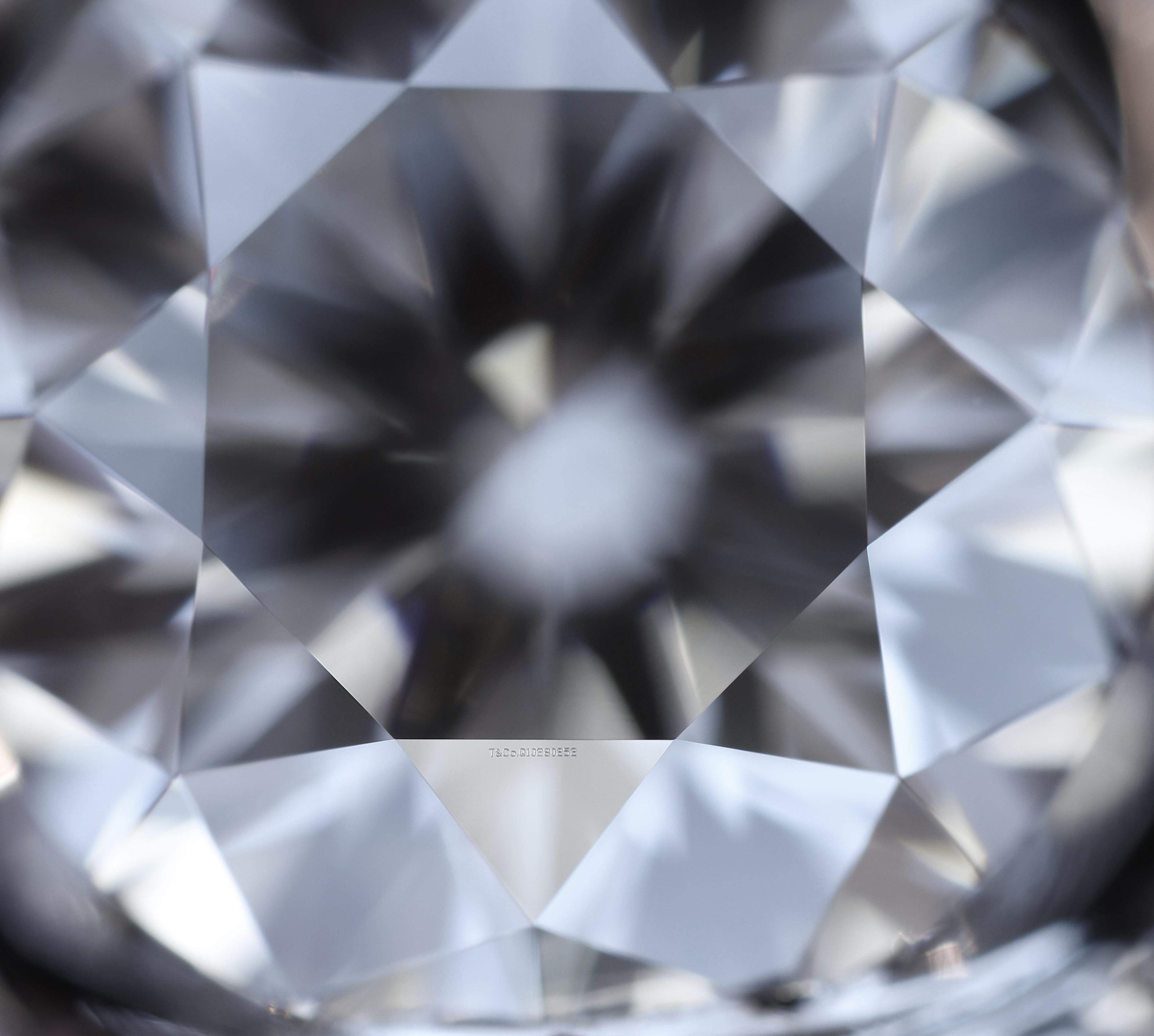 Tiffany & Co. Ribbon Platinum Round Diamond Engagement Ring 1.22ct Tw H-I VVS 4