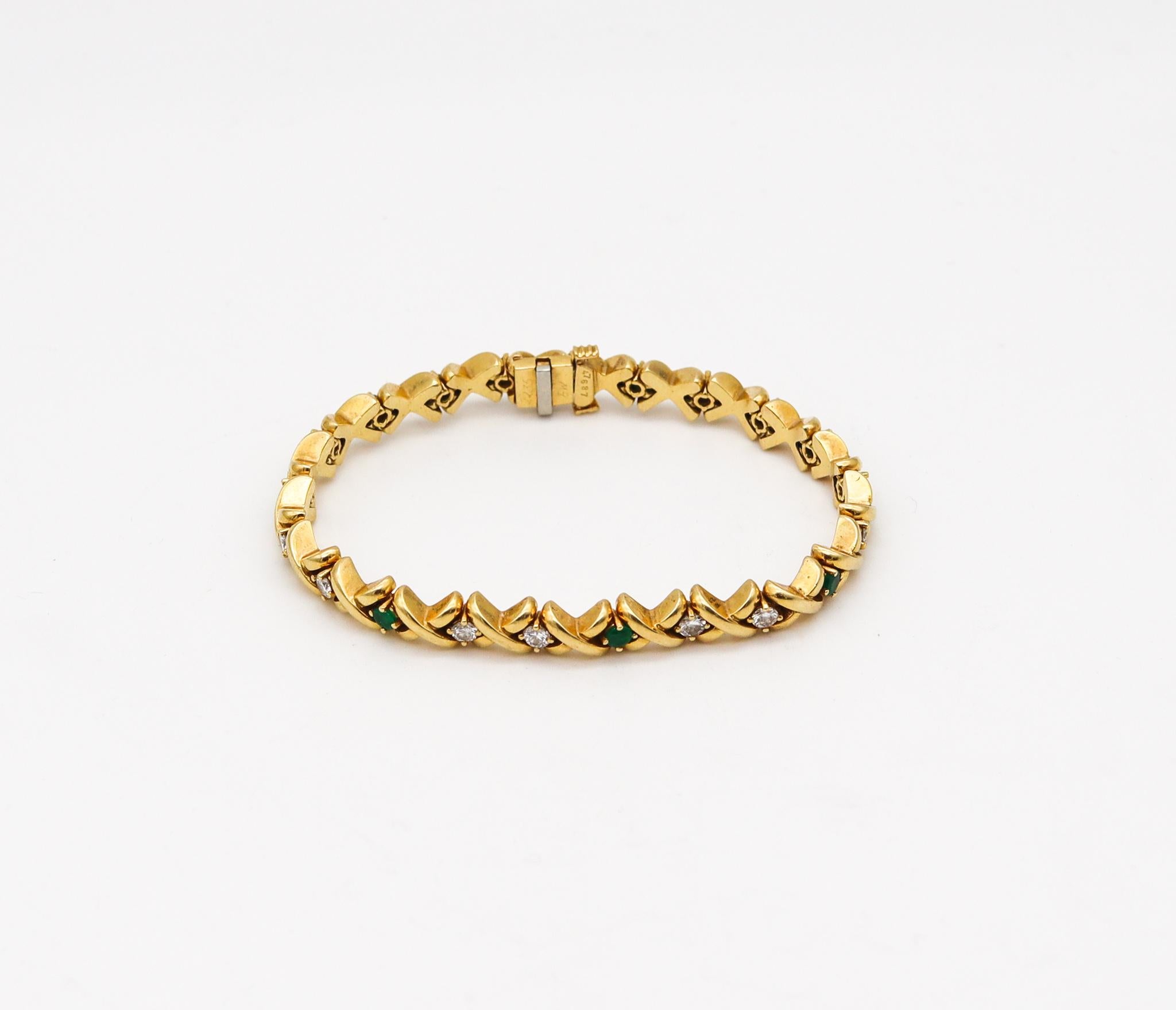 Riviera bracelet designed by Tiffany & Co.

A colorful riviera gemstones bracelet, created by Tiffany & Co. This piece was crafted with the iconic x patterns in solid yellow gold of 18 karats with high polished finish. Fitted with a double push