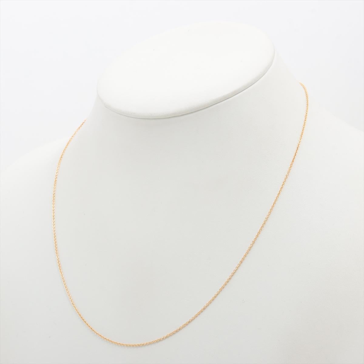 The Tiffany & Co. Rolo Link Chain Necklace in Gold is a true embodiment of timeless elegance and sophistication. The necklace features a classic rolo link chain, known for its durability and versatility. The links are carefully designed to interlock