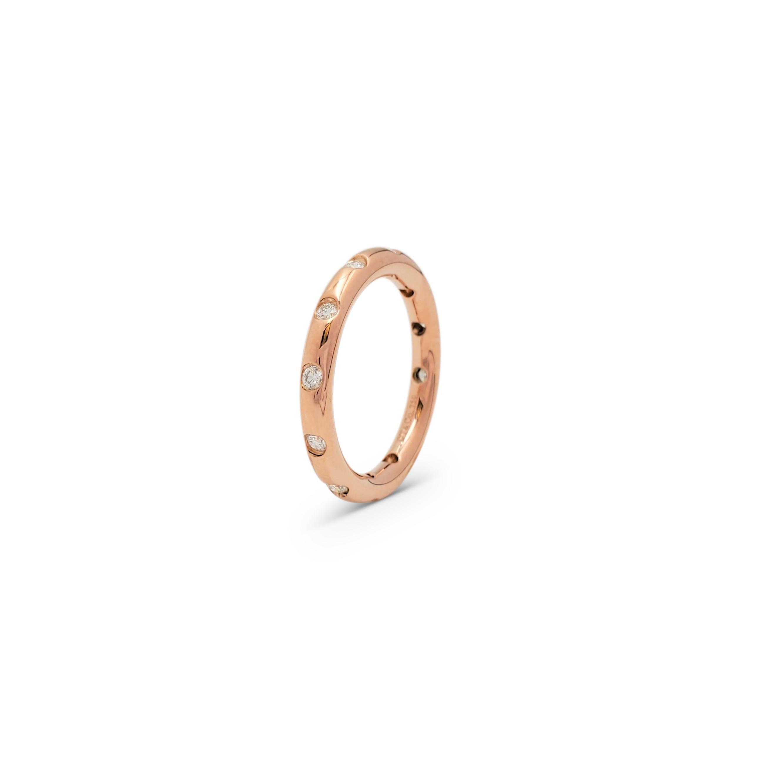 Authentic Tiffany & Co. stacking band ring crafted in 18 karat rose gold is bezel set with an estimated 0.13 carats of round brilliant cut diamonds (E-F, VS). Ring size 5. Signed T&Co., 750. The ring presented with the original pouch, no box or