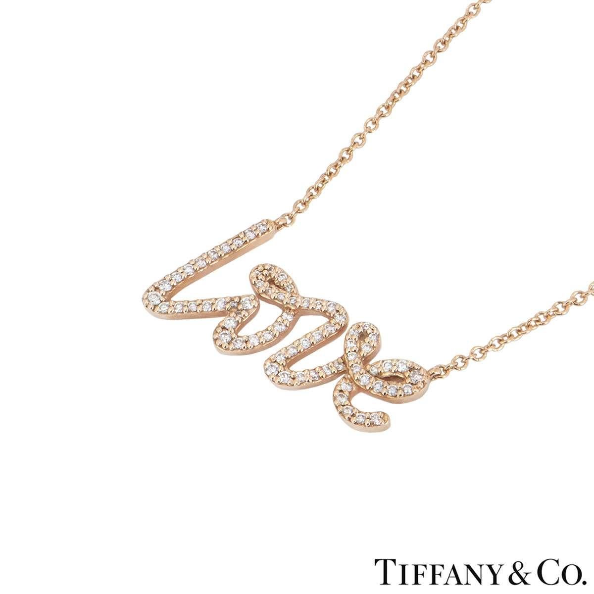 An 18k rose gold diamond necklace by Tiffany & Co. from the Love collection. The necklace features the word iconic 'Love' motif written in Paloma Piccaso own writing set with 68 round brilliant cut diamonds with a weight of 0.15ct. The necklace