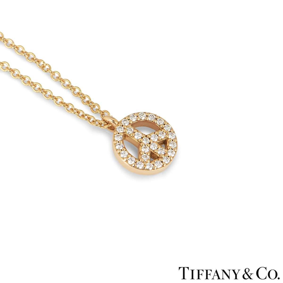 tiffany and co peace sign necklace