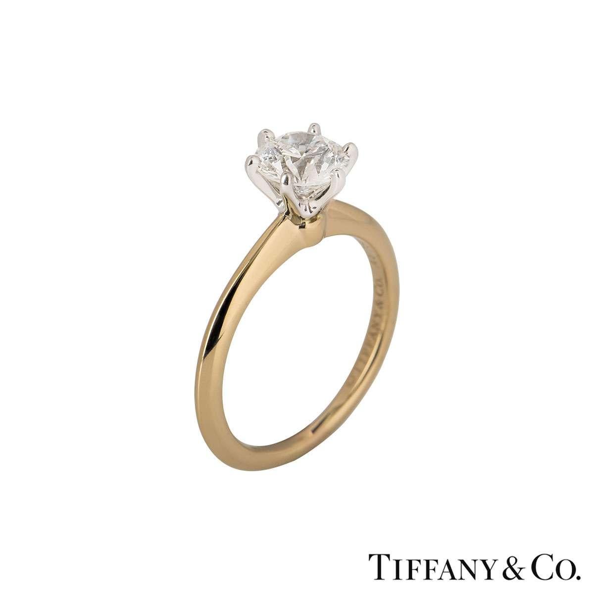 A stunning 18k rose gold diamond engagement ring by Tiffany & Co. from the Setting collection. The ring comprises of a round brilliant cut diamond in a 6 claw platinum setting with a weight of 0.95ct, H colour and VS1 clarity. The diamond scores an