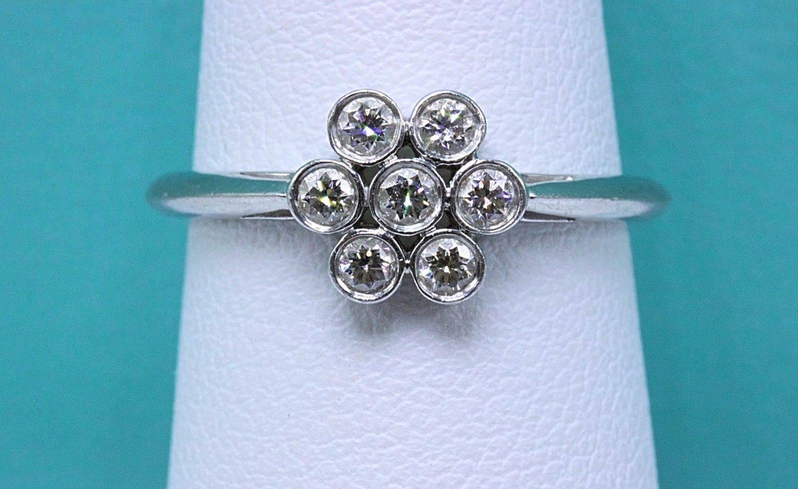 Women's Tiffany & Co. Round Brilliant 0.30 Carat F VVS Diamond Flower Ring in Platinum For Sale