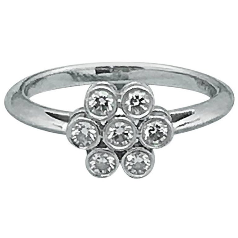 Tiffany and Co. Round Brilliant 0.30 Carat F VVS Diamond Flower Ring in  Platinum For Sale at 1stDibs | tiffany flower ring, tiffany and co flower  ring, tiffany diamond flower ring