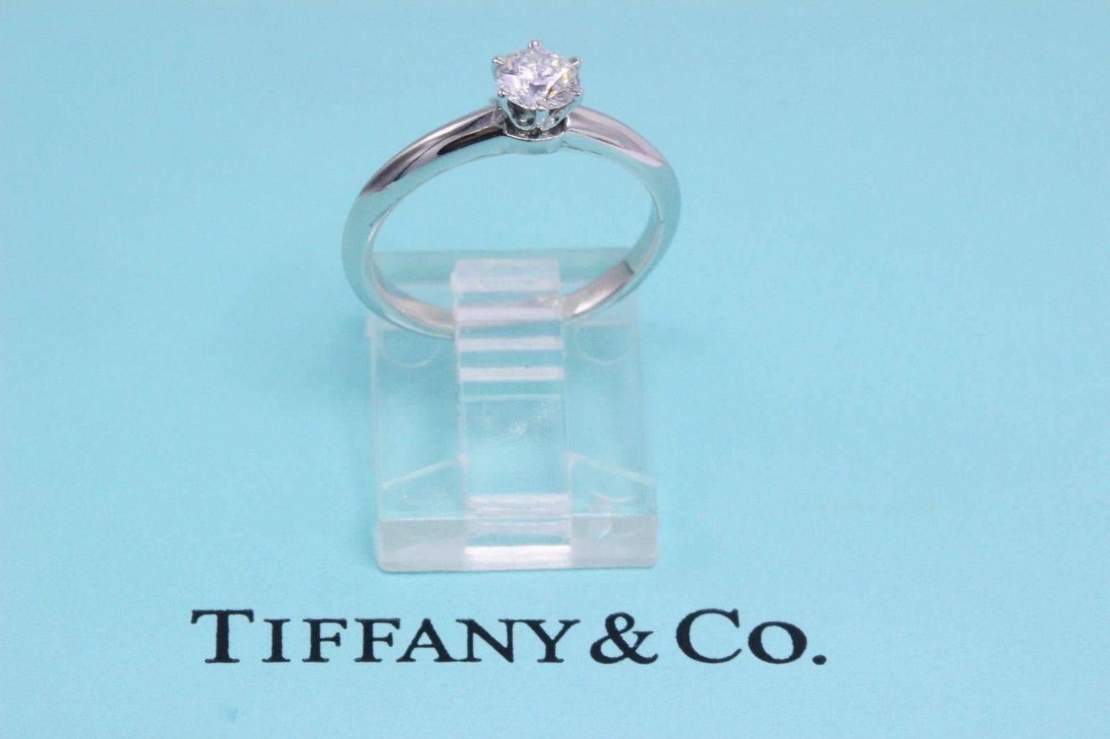 Tiffany & Co. Classic Engagement Ring
Style: 6 Prong Solitaire 
Serial Number: D56043
Metal:  Platinum PT950
Total Carat Weight:  0.40 TCW
Main Diamond Shape: Round Brilliant
Diamond Color & Clarity:  I / VVS2
Hallmark:  Tiffany&Co.PT950 D56043.40