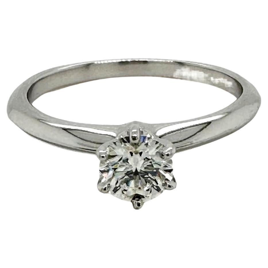 Tiffany & Co. Round Diamond Engagement Ring
Style:  6-Prong Classic Tiffany Setting
Ref. number:  69450733
SKU:  171-15-69450733
Metal:  Platinum PT950
Size:  6.25 - sizable
TCW:  0.47 cts
Main Diamond:  Round Brilliant Diamond
Color & Clarity:  I,