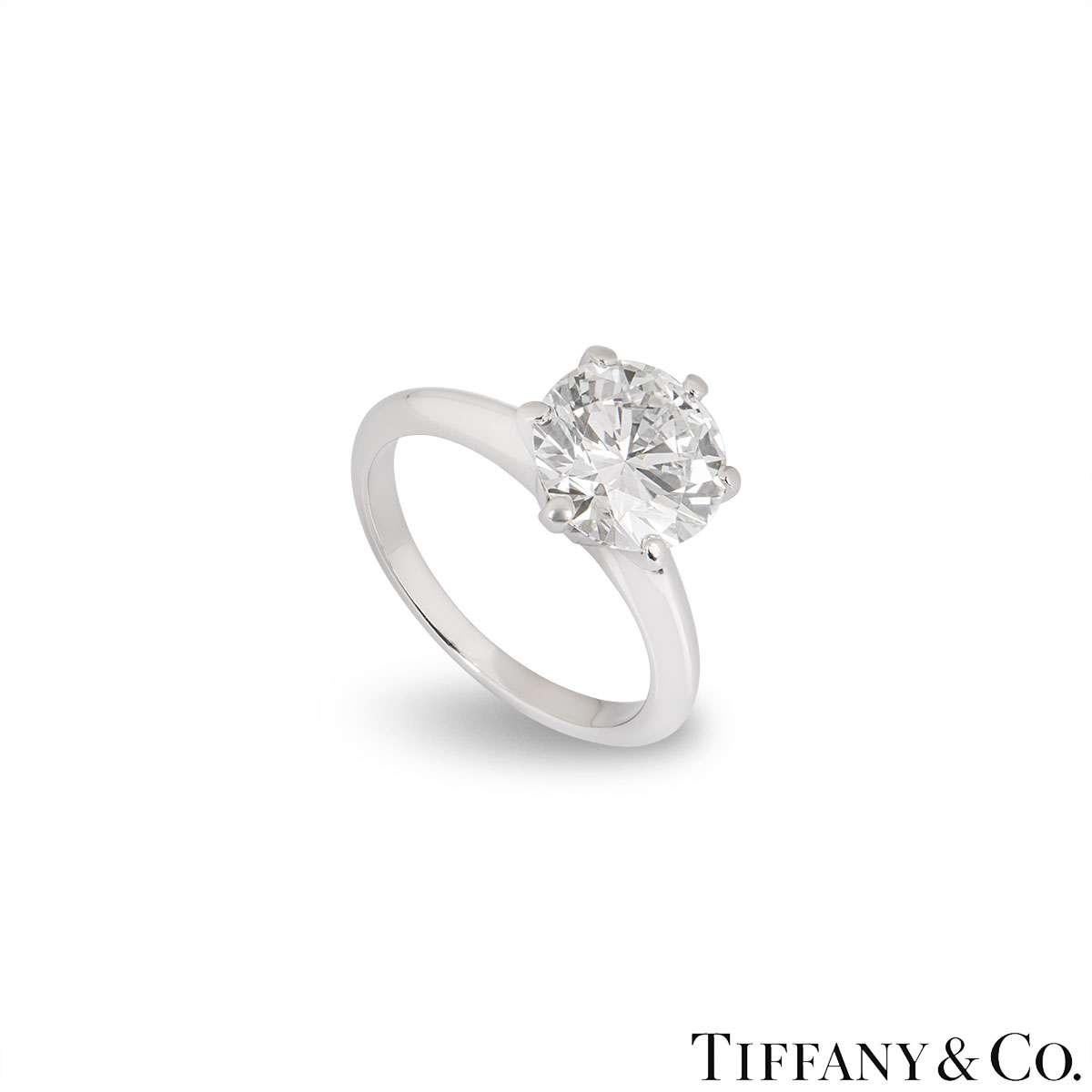 A beautiful platinum diamond ring by Tiffany & Co. from The Setting collection. The ring comprises of a round brilliant cut diamond in a 6 claw setting with a weight of 2.35ct, I colour and VVS2 clarity. The ring is a size UK J / EU 49 / UK 5 1/4