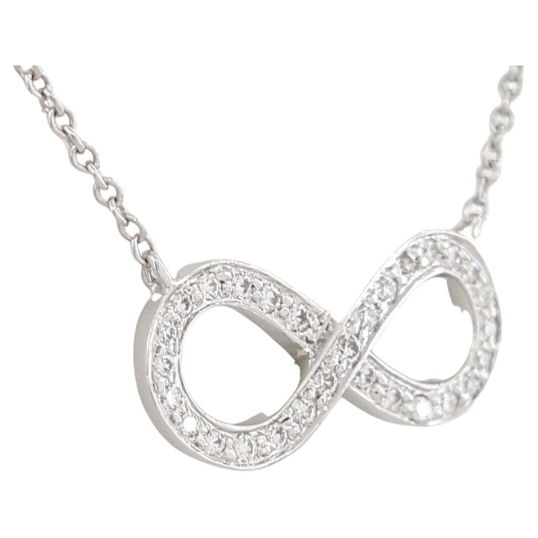 Tiffany & Company Platinum 0.22 ct Total Weight Round Brilliant Cut Diamond Infinity Pendant / Necklace 16