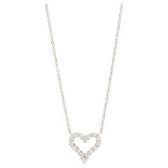 Tiffany 
Co. Round Brilliant Cut Diamond Platinum Tiffany Hearts Mini Pendant