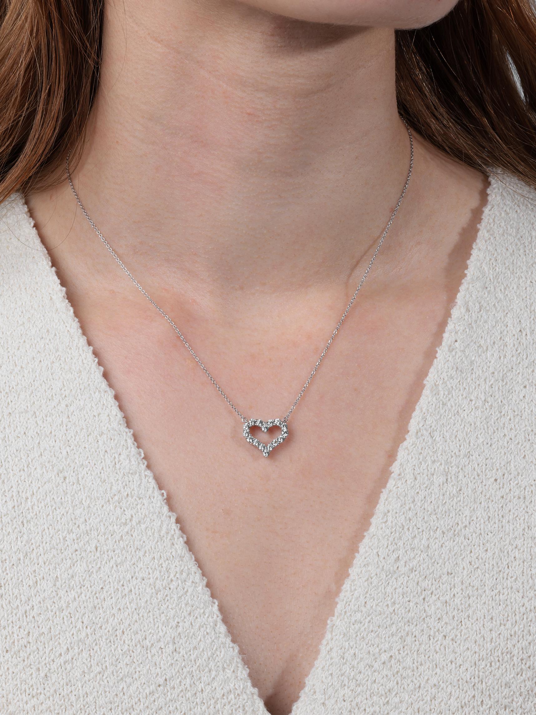 Tiffany & Co. Round Brilliant Cut Diamond Platinum Tiffany Hearts Small Pendant

Product Details
Xupes Ref: J1440
Brand: Tiffany & Co.
Model: Tiffany Hearts Small Pendant
Type: Pendant
RRP: £5,025
Accompanied By: Tiffany & Co. Box
Material(s):
