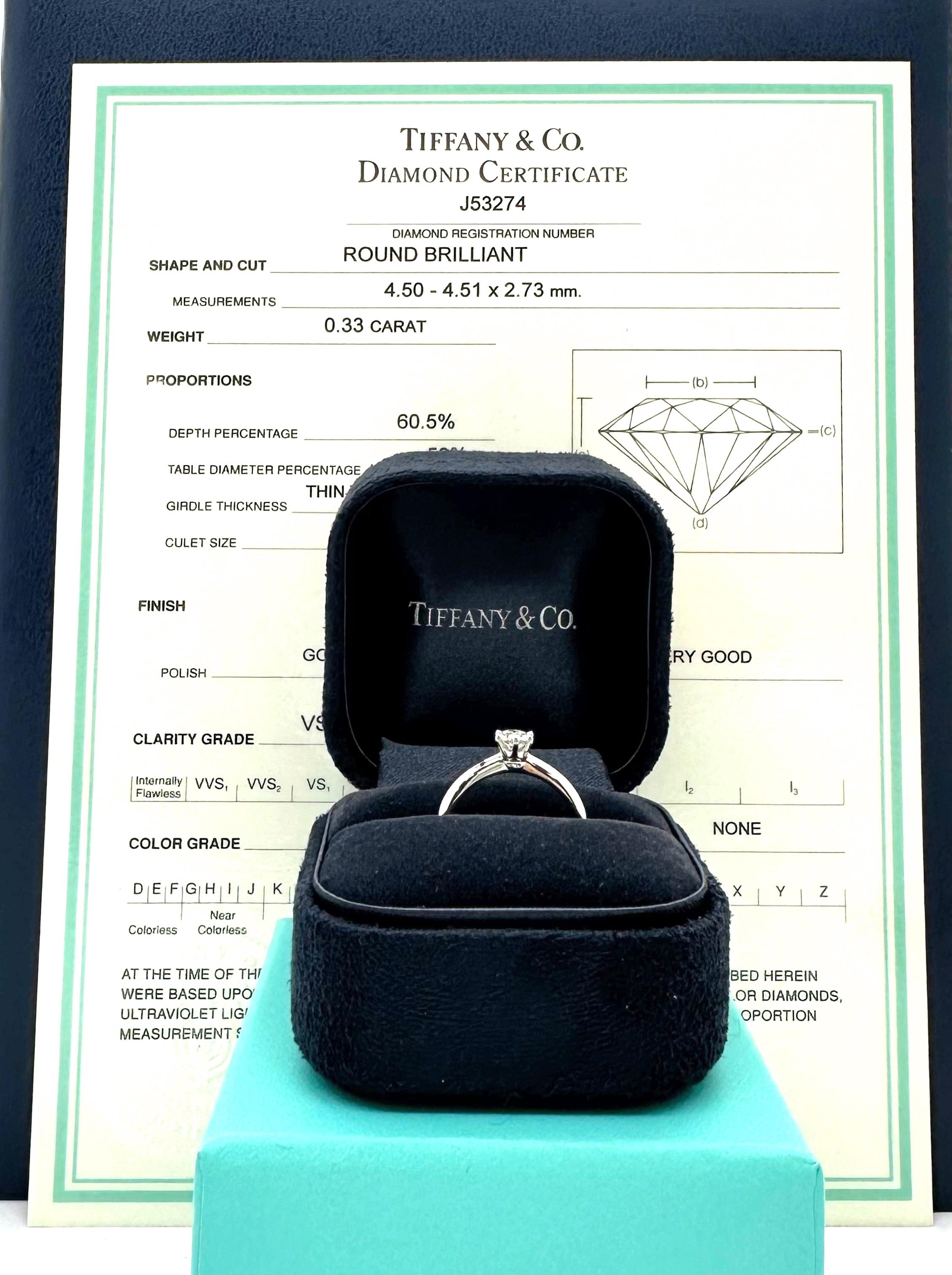 Tiffany & Co Round Brilliant Diamond Solitaire Engagement Ring
Style:  Solitaire 
Ref. number:  J53274
Metal:  Platinum Pt950
Size:  5 sizable
TCW:  0.33 cts
Main Diamond:  Round Brilliant Diamond
Color & Clarity:  H - VS1
Hallmark:  TIFFANY&CO
