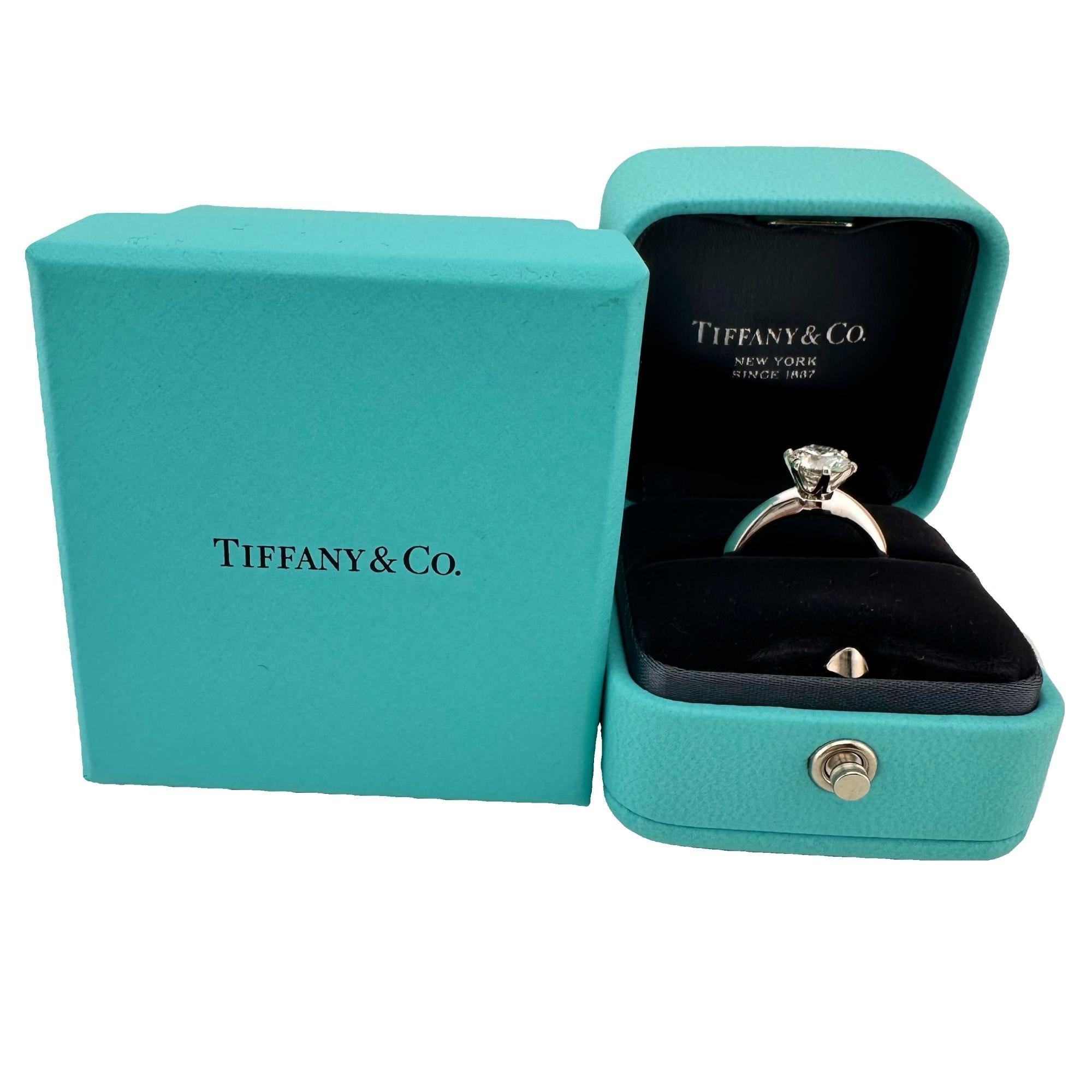 Tiffany & Co. Round Brilliant Diamond Solitaire Classic Engagement Ring
Style:  6-Prong Solitaire
Ref. number:  33402309
Metal:  Platinum Pt950
Size / Measurements:  4.75 - sizable
Main Diamond:  Round Brilliant Diamond 1.22 cts
Color & Clarity:  I,