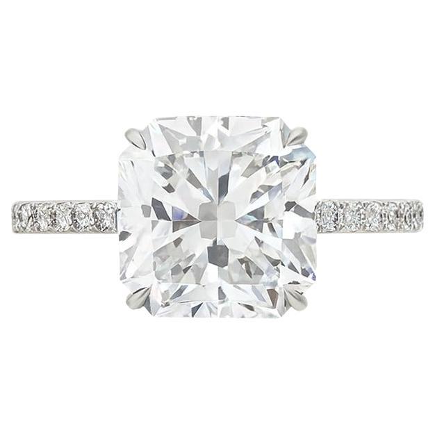 Tiffany & Co. Cut-Cornered Square Diamond Platinum Engagement Ring

Center diamond weighs 3.50 carats

Diamond is I color, VVS2 clarity

Stone is a cut-cornered square (Asscher style) diamond

Ring size 5 (this ring is resizable)