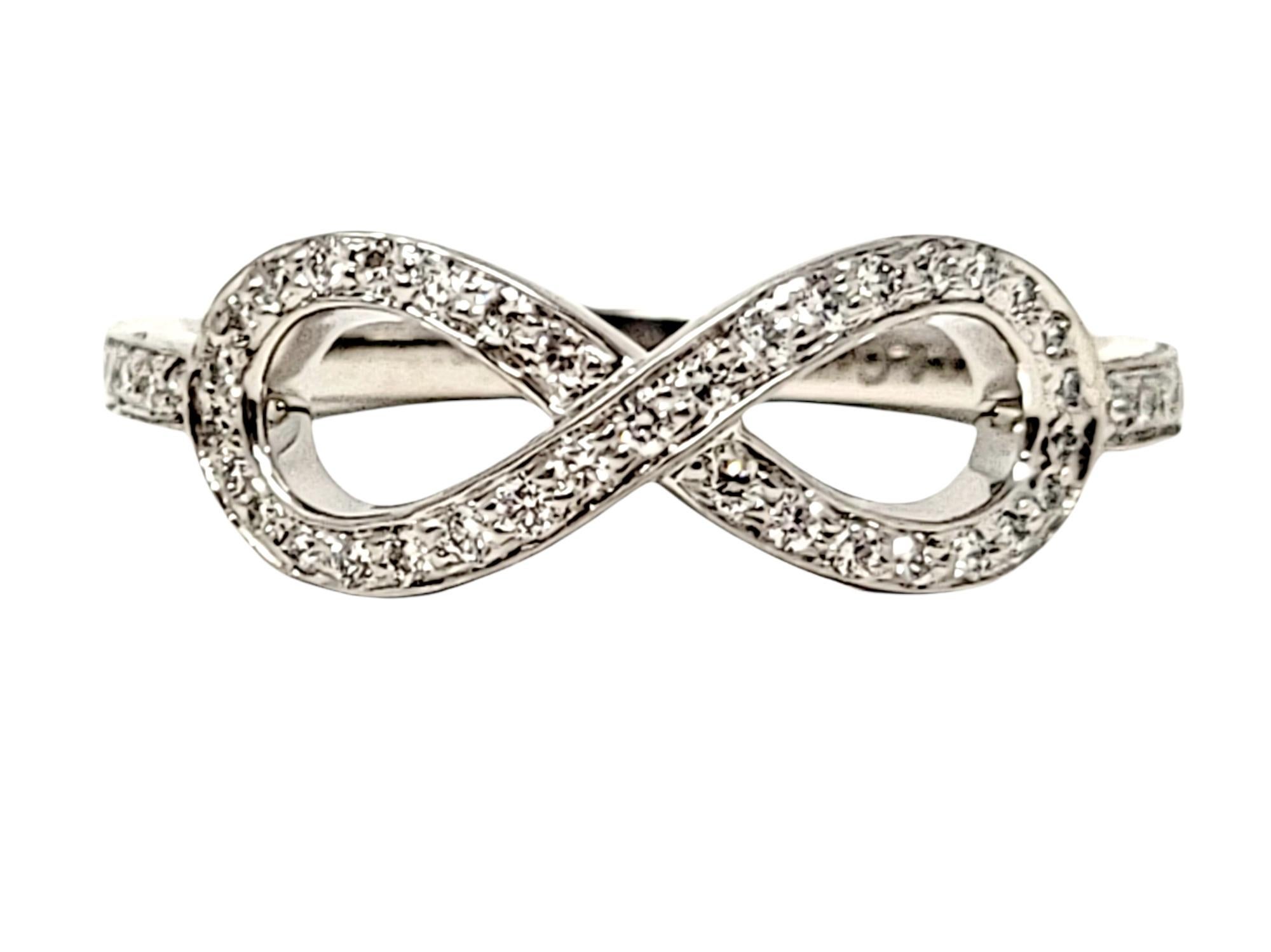 Ring size: 5.25

This lovely and delicate Tiffany Infinity ring will stand the test of time. The timeless design features a single infinity symbol arranged in a horizontal layout on a platinum band. The figure 8 shaped design is embellished with .14