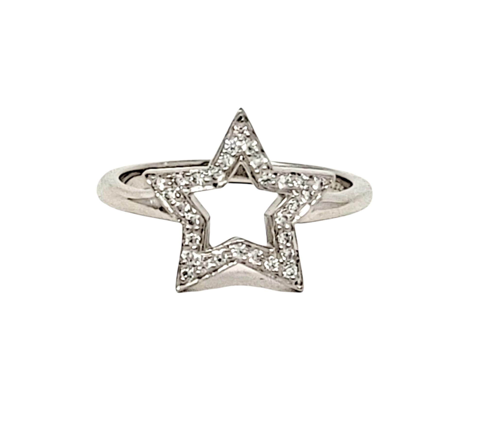 Ring size: 3.5

This lovely and delicate Tiffany star ring will stand the test of time. The timeless design features a single 5 point star on a thin platinum band. The star is embellished with .10 carats of sparkling round pave diamonds, F-G in