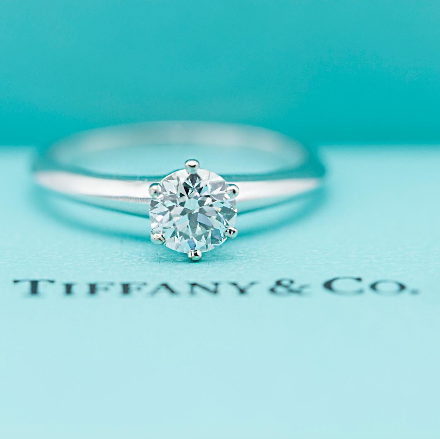 Tiffany & Co.
Style: Solitaire
Metal:  Platinum PT950
Size: 6.5  - sizable  
Total Carat Weight:  0.77 TCW 
Diamond Shape: Round Brilliant
Diamond Color & Clarity: H / VVS2
Hallmark: 