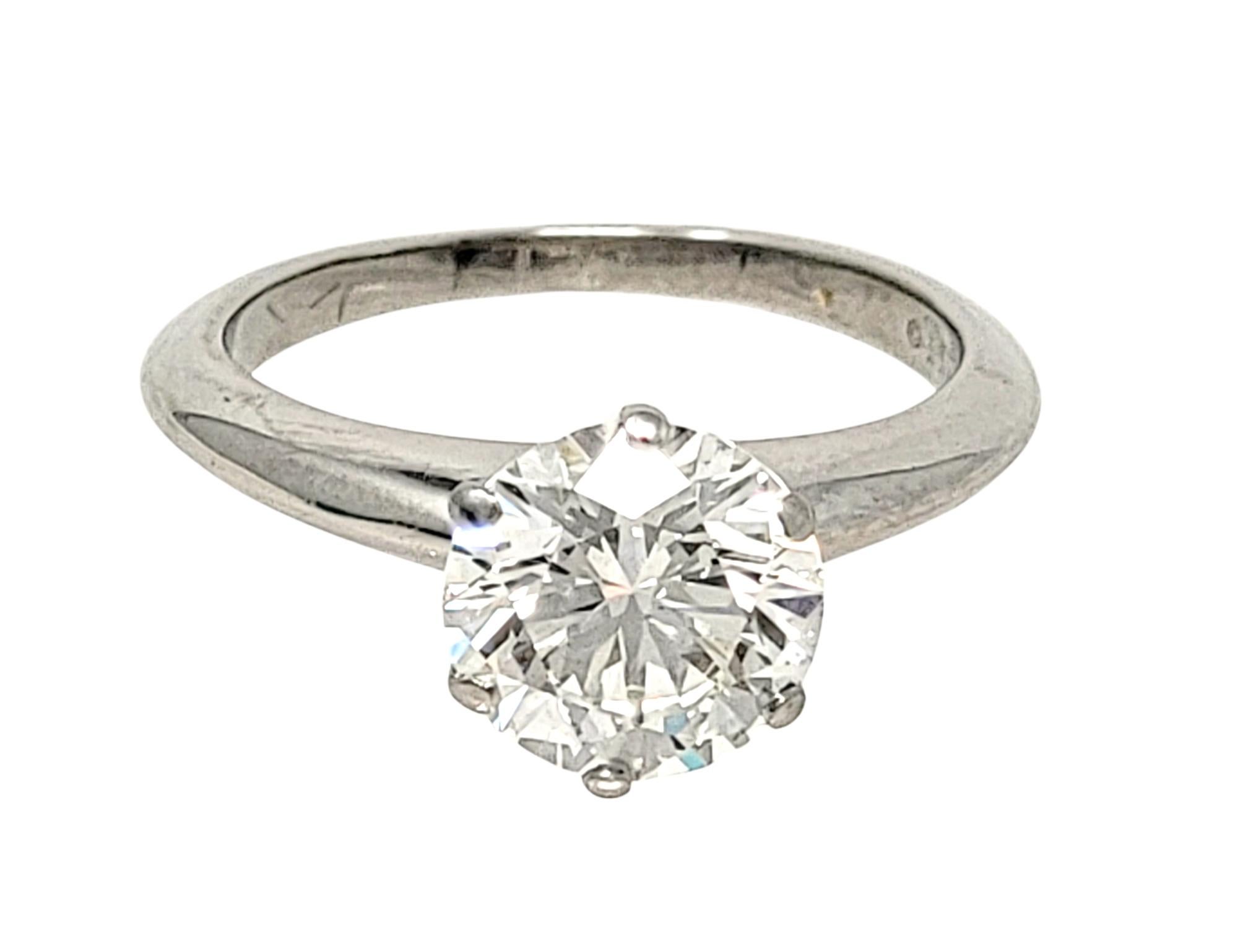 Ring size: 4.25

Say yes to this amazing diamond solitaire engagement ring from Tiffany & Co.! This classic, Tiffany style diamond solitaire ring is the epitome of timeless elegance. The round brilliant, bright icy white diamond sparkles radiantly