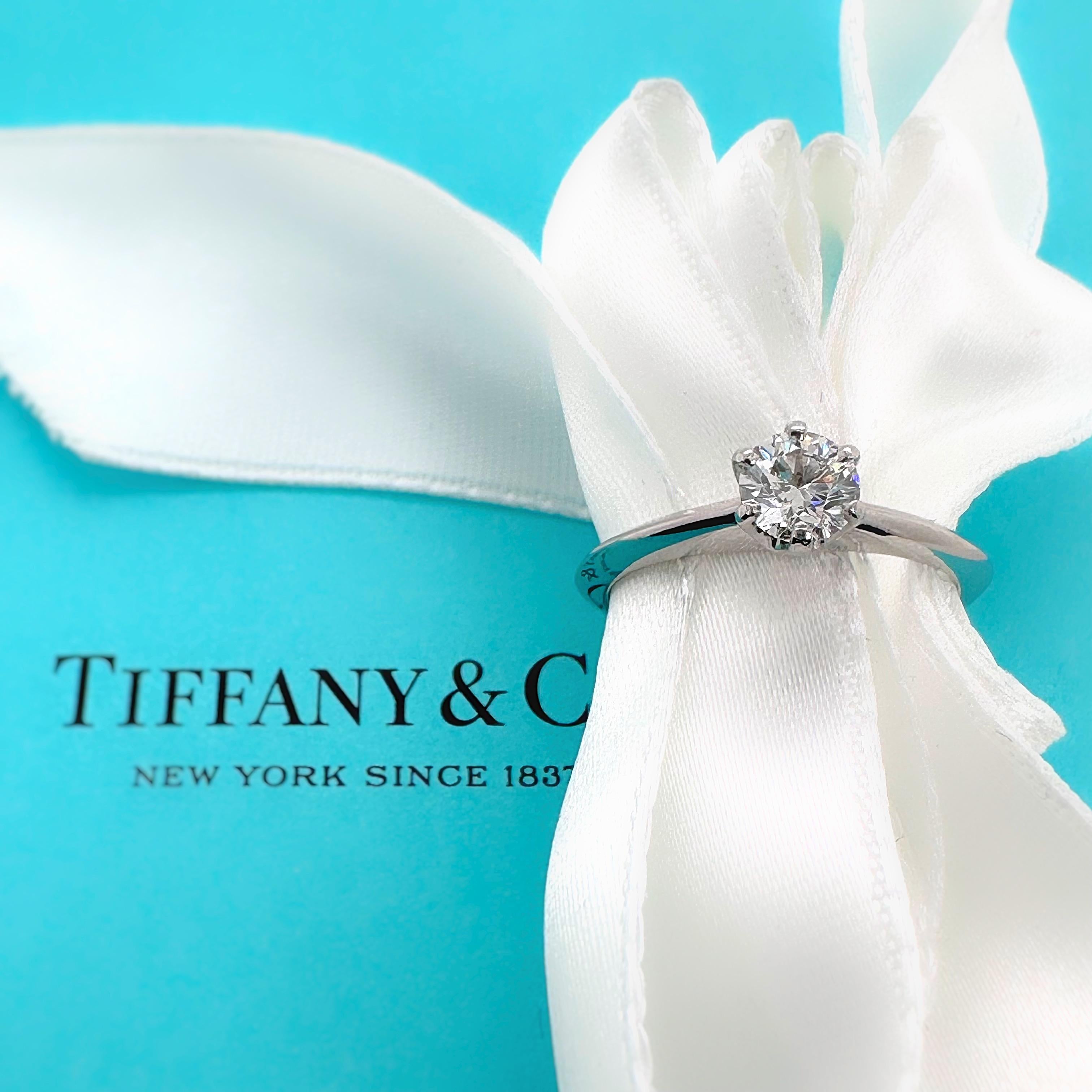 Tiffany & Co. Classic Round Diamond Solitaire Engagement Ring
Style:  Solitaire
Dia. number:  19481263/F11190187
Metal:  PLATINUM PT950
Size:  5.5 Sizable 
Band Width:  1.9 mm
Main Diamond:  Round Brilliant Diamond 0.42 cts
Color & Clarity:  D,