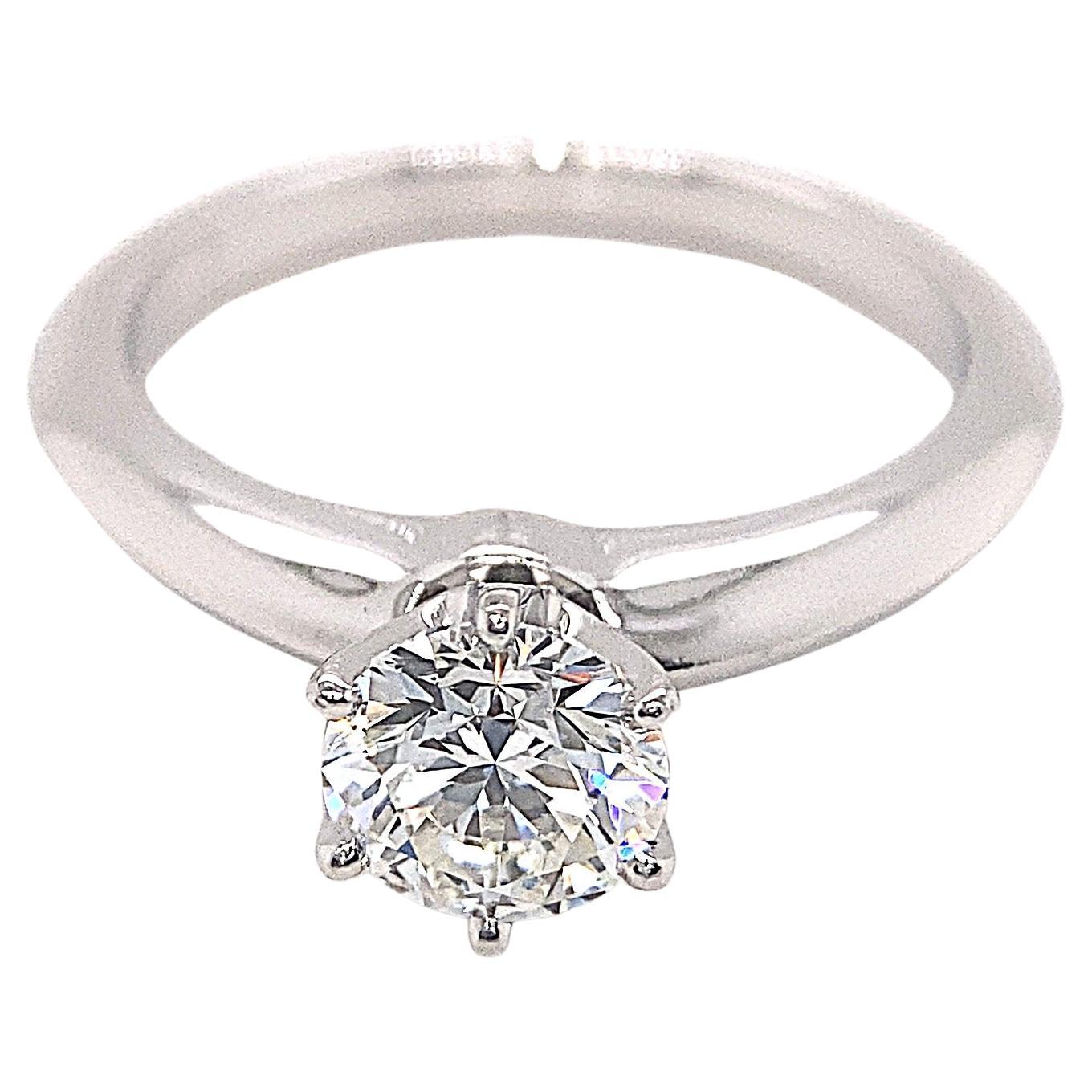 Tiffany and Co. Platinum and Diamond Halo Round Engagement Ring .51