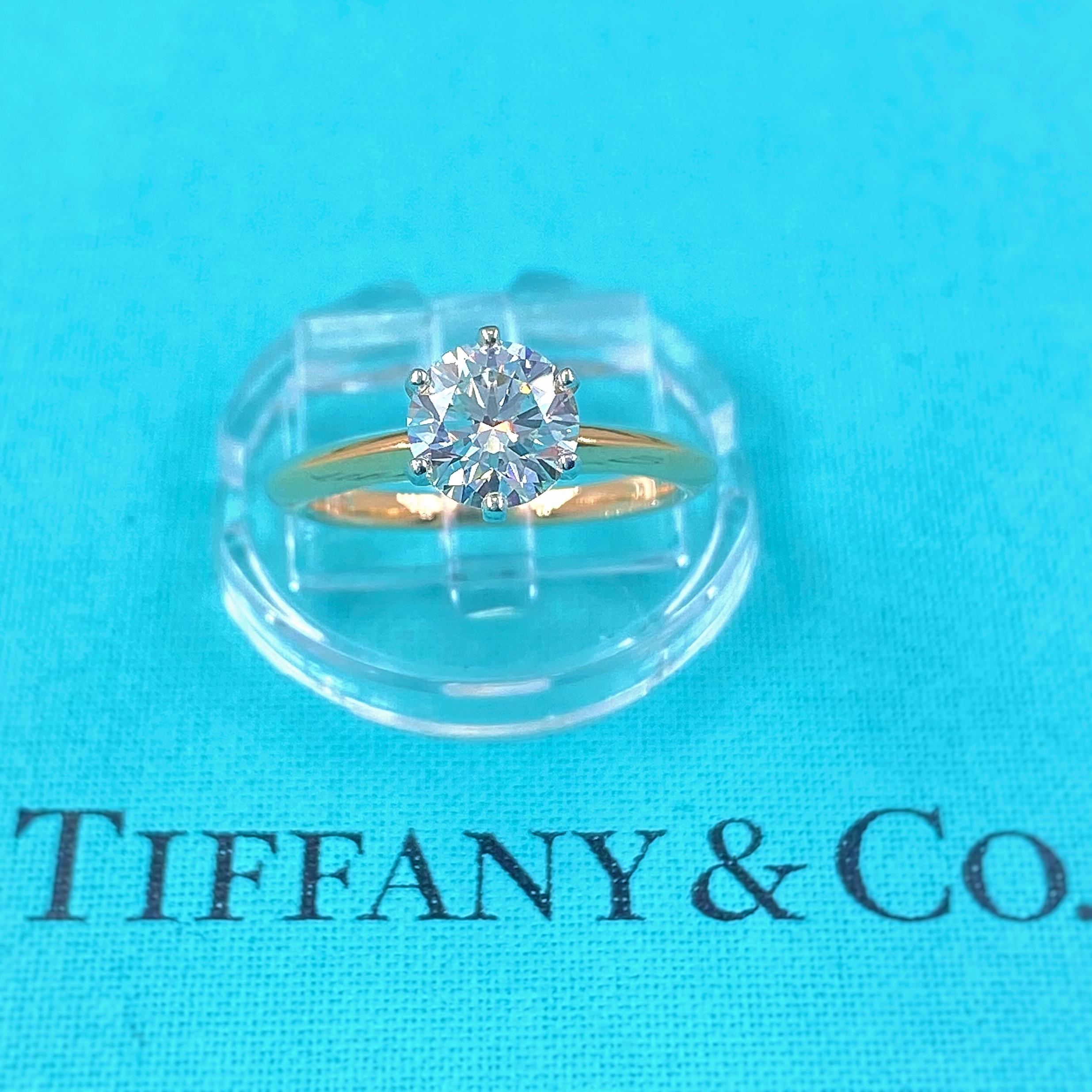 Tiffany & Co. Solitaire Engagement Ring
Style:  Classic 6-Prong Solitaire
Ref. number:  67205537 / T12040159
Metal:  18kt Rose Gold & Platinum
Size:  6 - sizable
TCW:  1.18 tcw
Main Diamond:  Round Brilliant cut Diamond 
Color & Clarity:  H / VS1