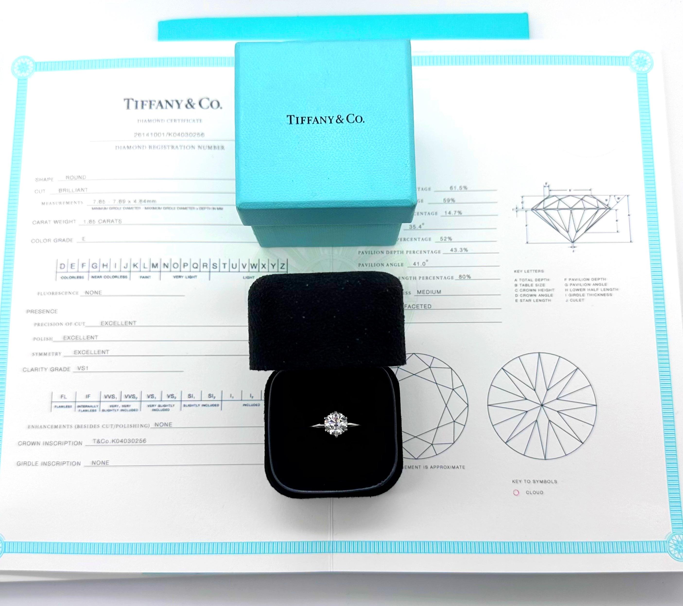 Tiffany & Co Round Diamond Tiffany Setting Engagement Ring
Style:  6 Prong Solitaire
Ref. number:  26141001 / K04030256
Metal:  Platinum PT950
Size:  6.25 
Measurements:  2 mm
TCW:  1.85 tcw
Main Diamond:  Round Brilliant Diamond 
Color & Clarity: 