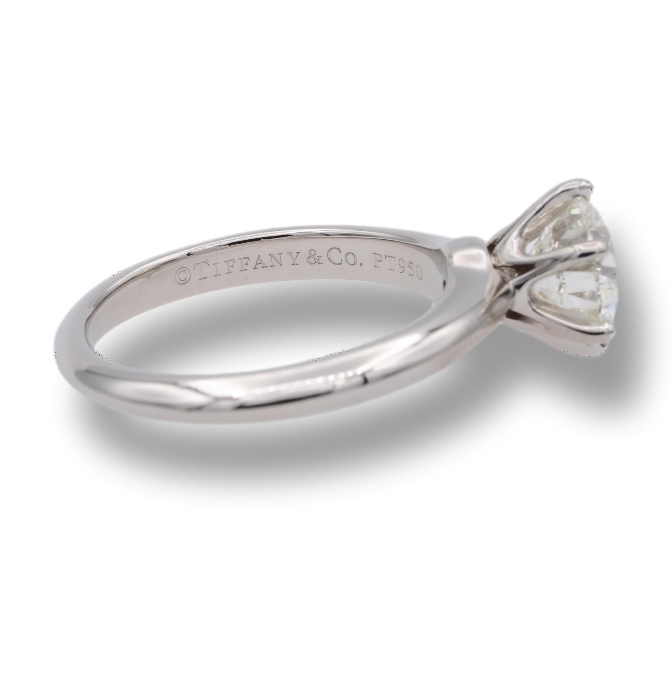 Tiffany & Co. Engagement ring finely crafted in platinum with a 1.26 ct I color VS1 clarity. This ring has been inspected and appraised by IGI Laboratory( International Gemological Institute) as an authentic Tiffany ring with all the ring