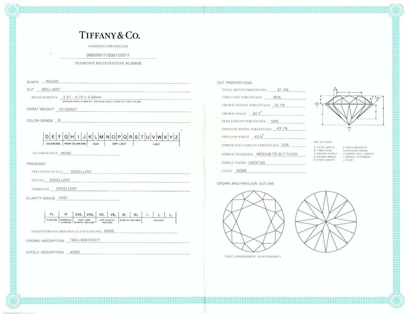 Tiffany & Co. Round Diamond Engagement Ring .70 Ct G VVS1 18k and Platinum 1