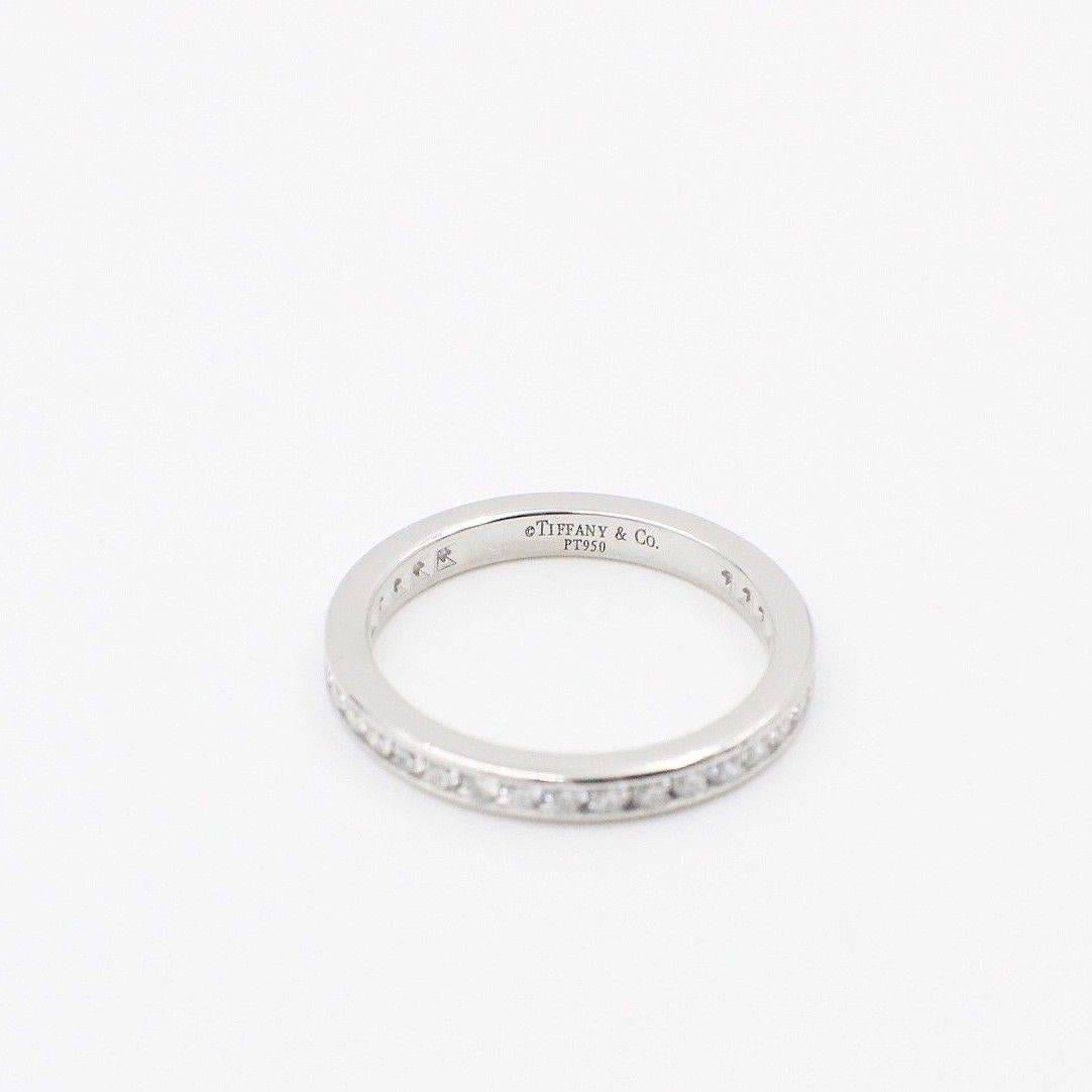 Tiffany & Co.
Style:   Full Circle Diamond Wedding Band Ring 2MM
Sku Number:  16181099
Metal:  Platinum PT950
Size:  4.5 
Total Carat Weight:  0.36 TCW
Diamond Shape:  Round Brilliant Diamonds 0.36 TCW
Diamond Color & Clarity:  F - G /