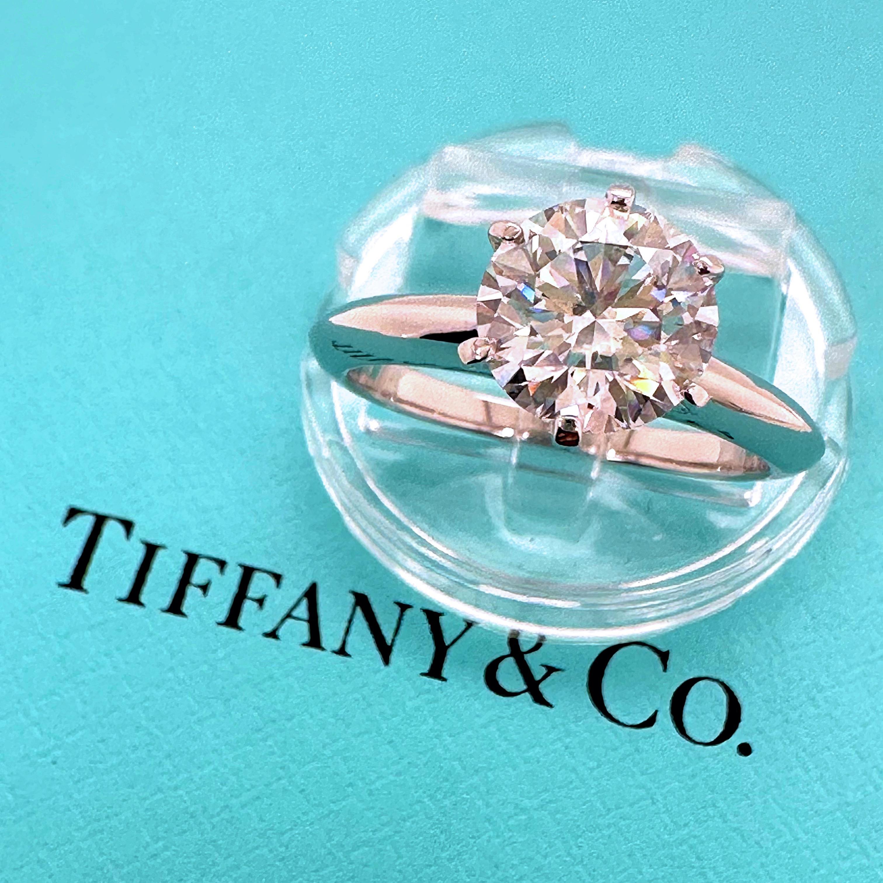 Tiffany & Co. Tiffany Setting Engagement Ring 
Style:  Solitaire
Ref. number:  35149589 / P12100279
Metal:  Platinum PT950
Size:  7 sizable
Measurements:  2 mm
TCW:  1.72 cts
Main Diamond:  Round Brilliant diamond
Color & Clarity:  H, VVS2
Diamond