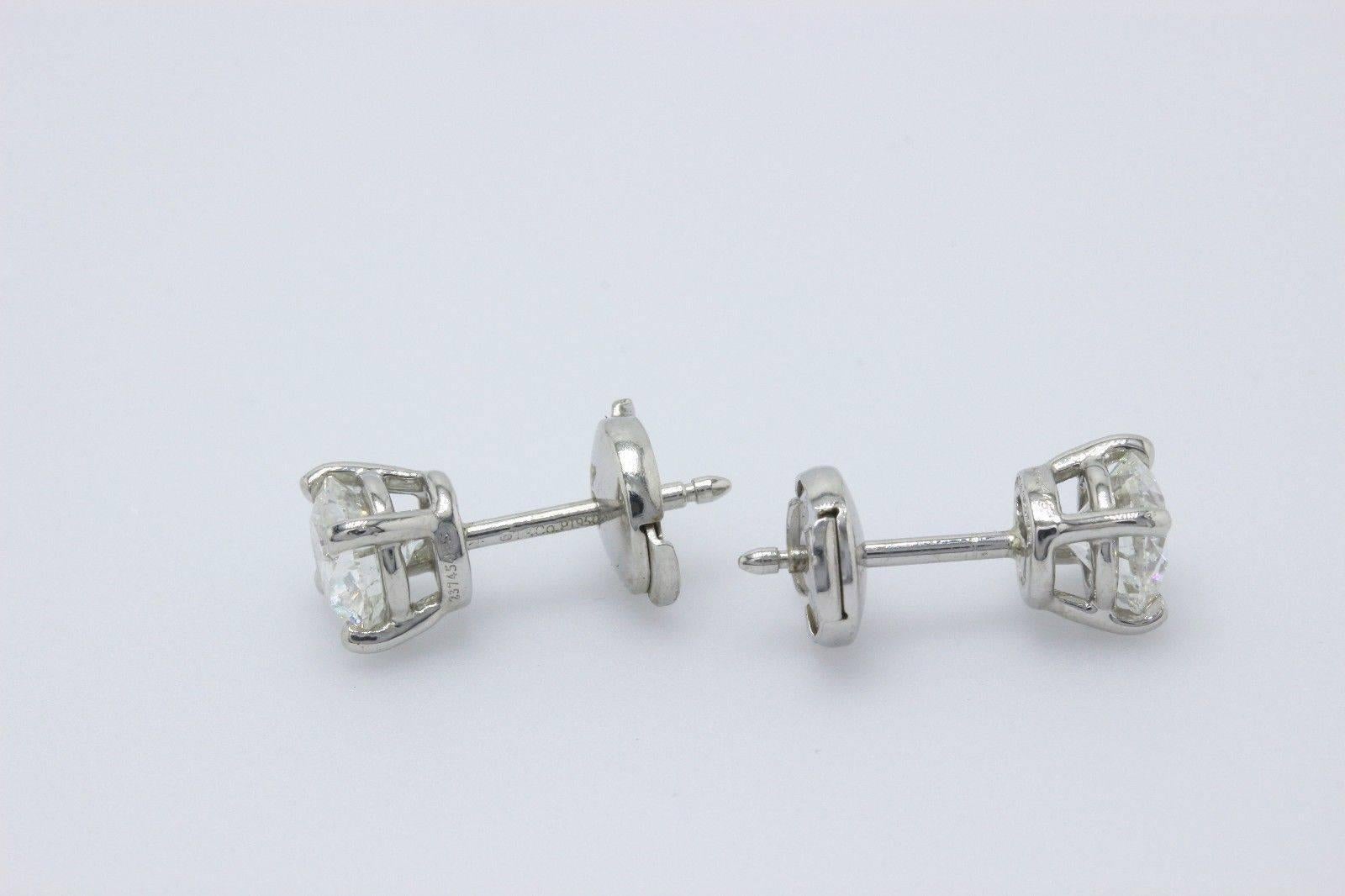 Round Cut Tiffany & Co. Round Diamond Stud Earrings 2.02 TCW G VS1 and VS2 Platinum