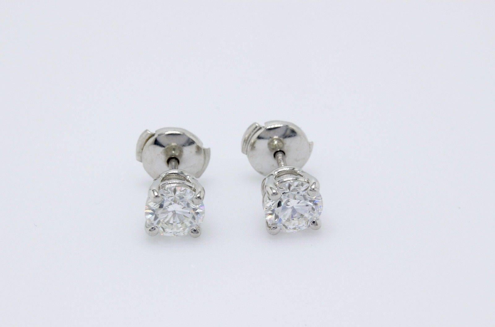 Tiffany & Co. Round Diamond Stud Earrings 2.02 TCW G VS1 and VS2 Platinum In Excellent Condition In San Diego, CA