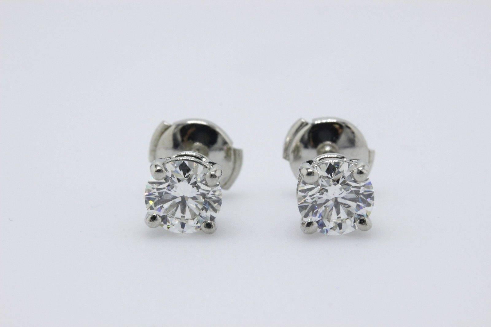 Tiffany & Co. Round Diamond Stud Earrings 2.02 TCW G VS1 and VS2 Platinum 3