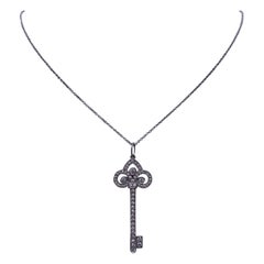Tiffany & Co Round Nrilliant Diamonds Platinum Fleur de Lis Key Pendant Medium