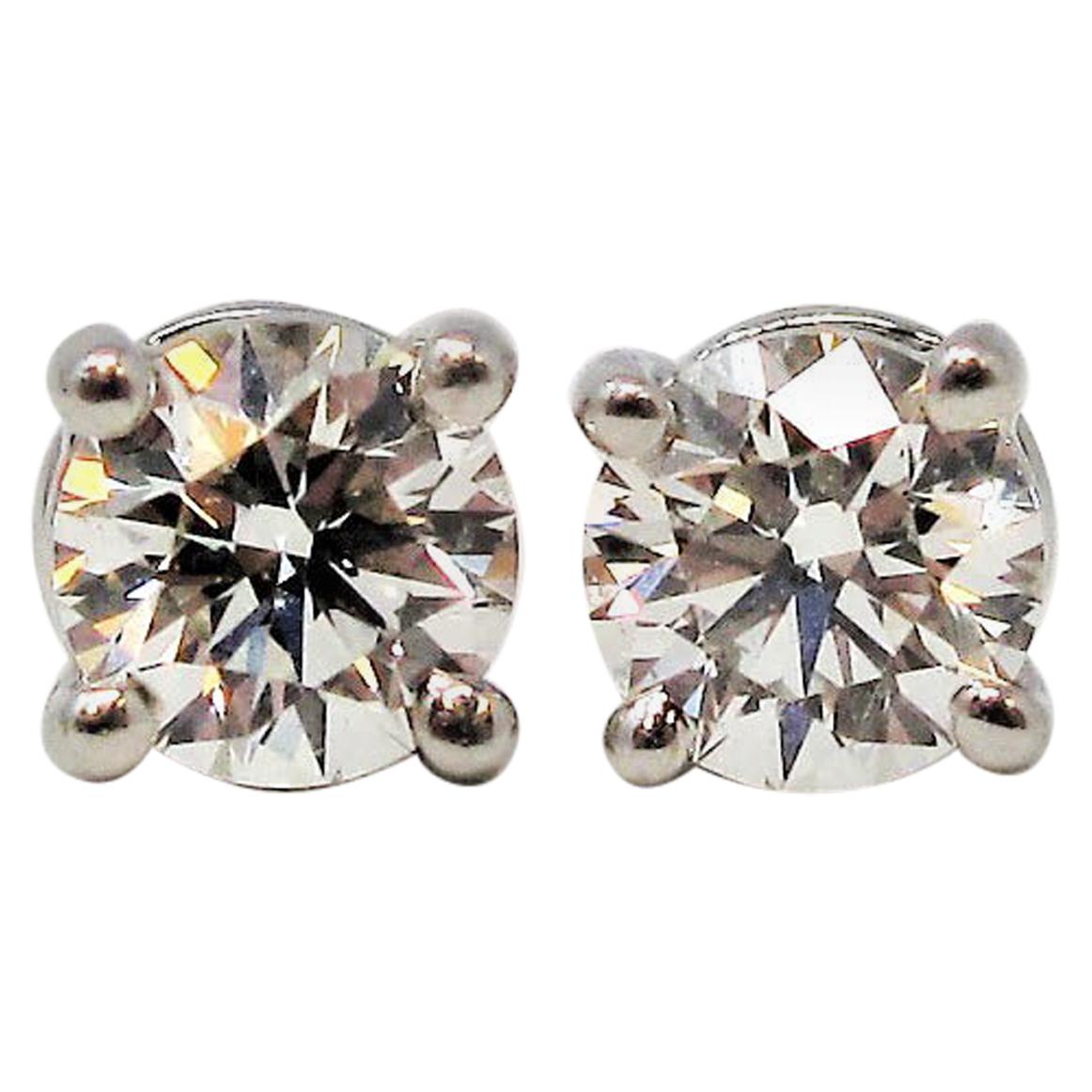 Tiffany & Co. Round Solitaire Diamond Stud Earrings in Platinum F/VS1 .42 Carat