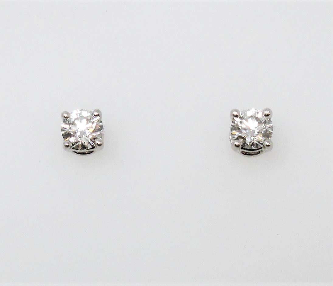 tiffany solitaire diamond stud earrings in platinum