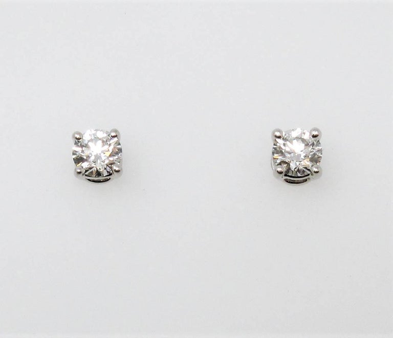 Tiffany and Co. Round Solitaire Diamond Stud Earrings in Platinum F/VS1