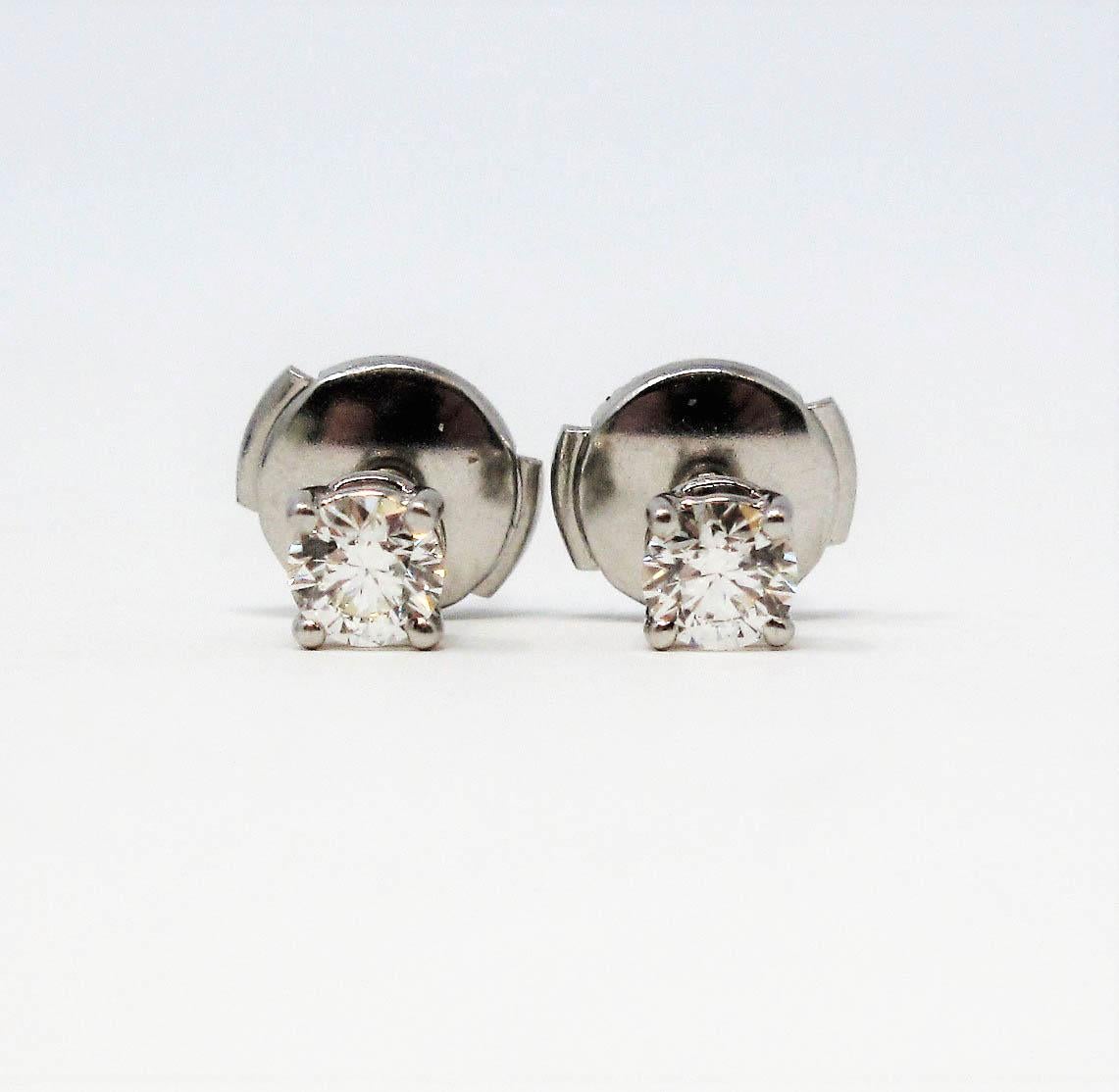 Women's or Men's Tiffany & Co. Round Solitaire Diamond Stud Earrings in Platinum F/VS1 .42 Carat
