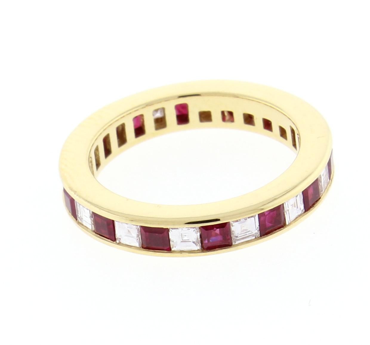 From Tiffany & Co. Channel set band collection, a band of rubies and diamonds
 ♦ Designer / Hallmarks: Tiffany & Co
♦ Metal: 18 karat,  
♦ Gem stone: 14 Square  Diamonds = .84 total carats F-G/VVS-VS
♦ Gem stone: 14 Square Rubies = .95 total carats