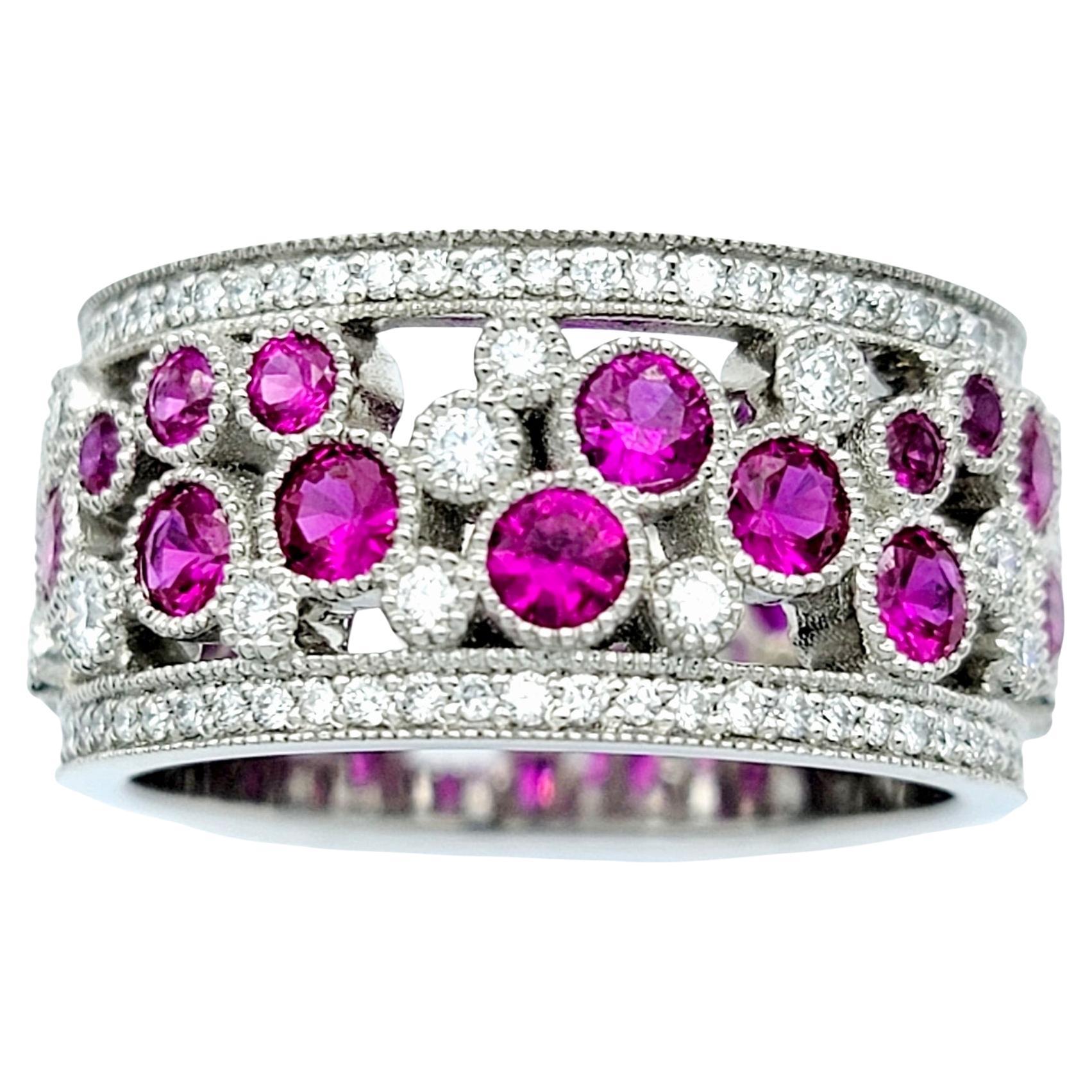 Size 6.75

Stunningly sparkly Cobblestone band ring from Tiffany & Co. This amazing piece is filled with  dazzling white diamonds and sparkling red rubies set in a playful path of cobblestones throughout the ring. You'll simply adore how these