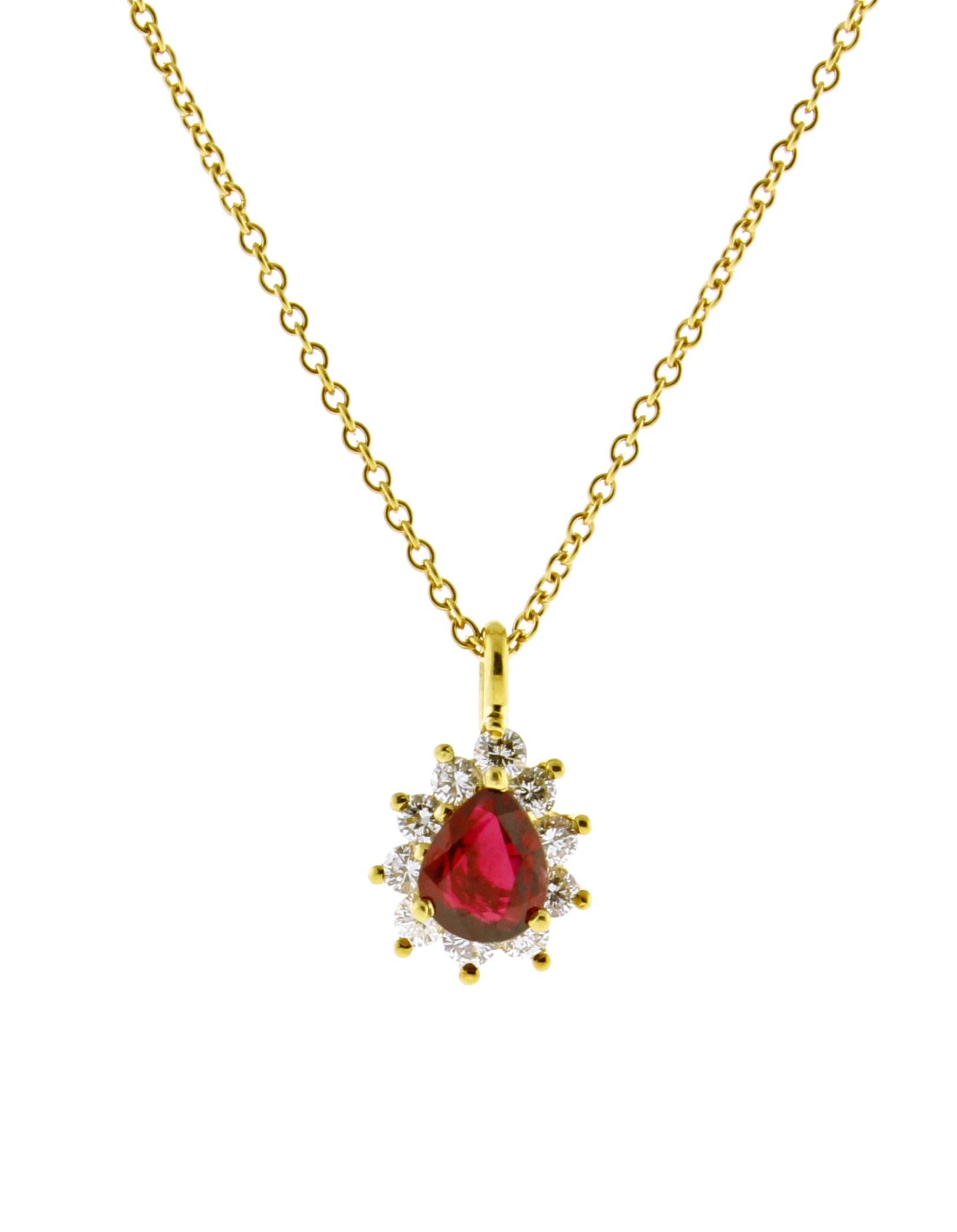 From Tiffany & Co. a pear-shape red ruby and diamond teardrop pendant.
♦ Designer: Tiffany & Co.
♦ Metal: 18 karat
♦ Ruby = .50ct
♦ 10 Diamonds=.40 carats
♦ Circa 1990s
♦ 16 inch chain, pendant 8.2mm wide
♦ Packaging: Tiffany Box
♦ Condition: