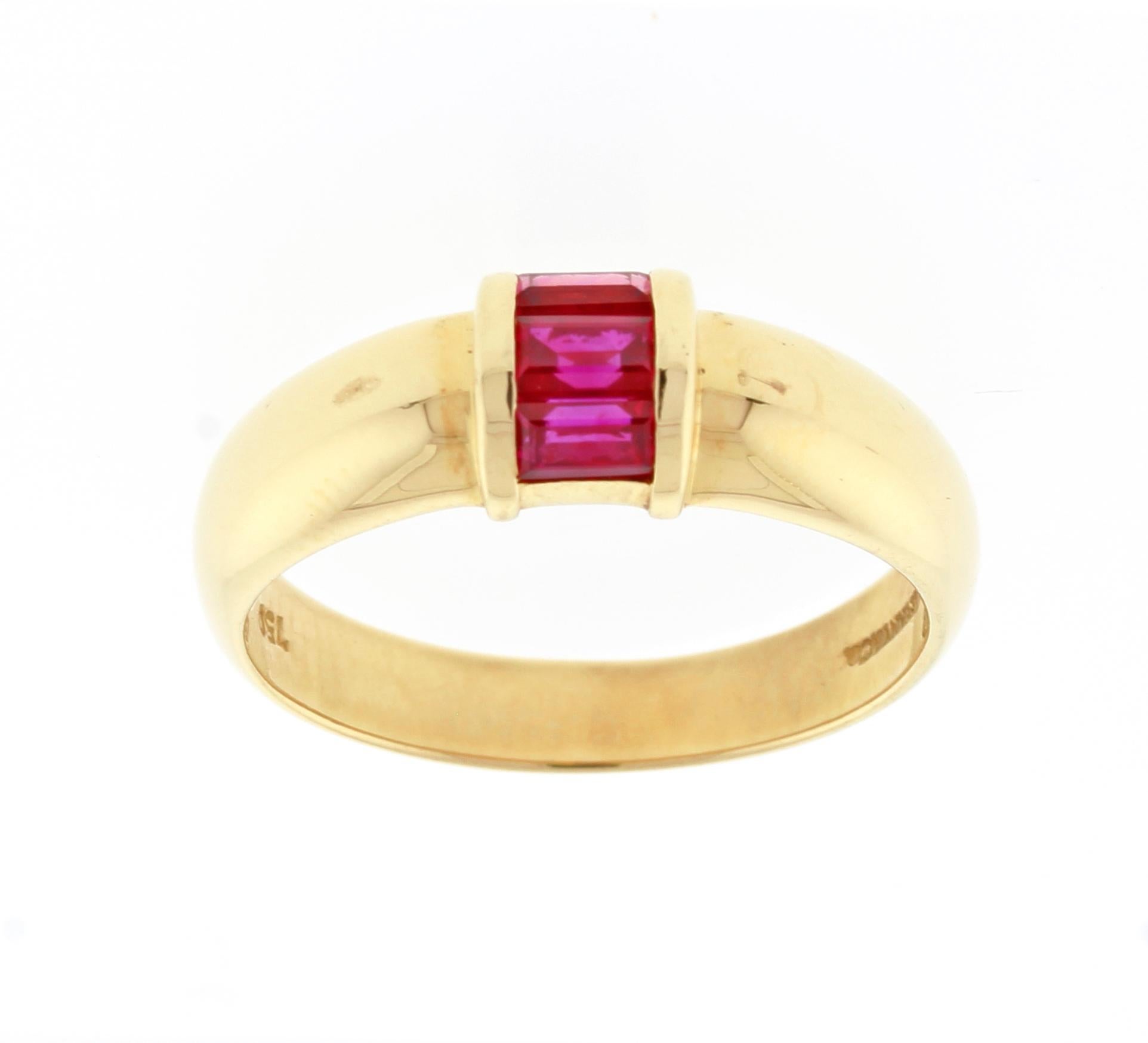 From Tiffany & Co.  a sleek band featuring three baguette rubies.
♦ Designer: Tiffany & Co.
♦ Metal: 18 karat
♦ 4.3 grams
♦ 3 Rubies = .30 carats
♦ Circa 2000 
♦ Size 7 Resizable
♦ Packaging: Tiffany pouch
♦ Condition: Excellent , pre-owned
♦ Price: