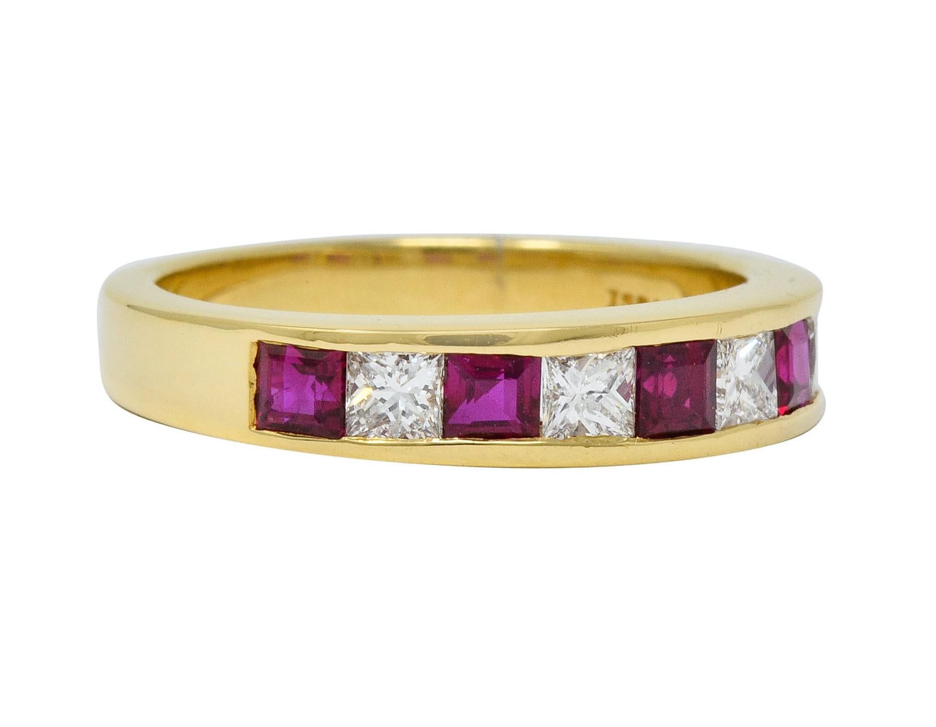 Band ring channel set to front with alternating square cut ruby and princess cut diamonds

Diamonds weigh approximately 0.50 carat total with F/G color and VS clarity

Rubies are a very well-matched bright red color and weigh approximately 0.80