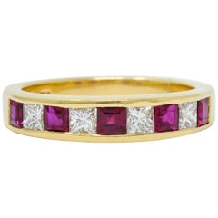 Retro Tiffany & Co. Ruby Diamond 18 Karat Gold Channel Band Ring, circa 1990