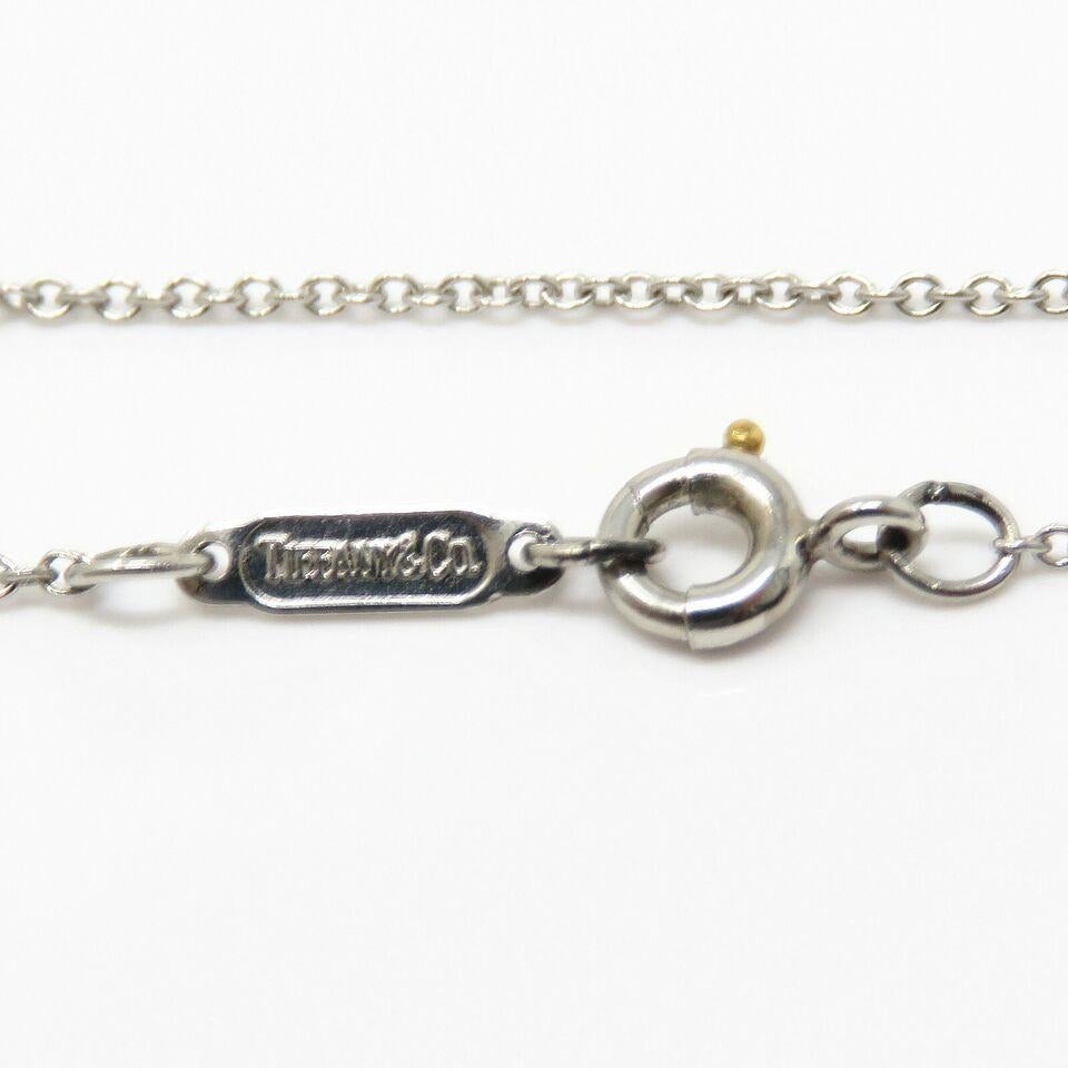 Taille ronde Tiffany & Co. Collier en or jaune 18K avec rubis et diamants en vente